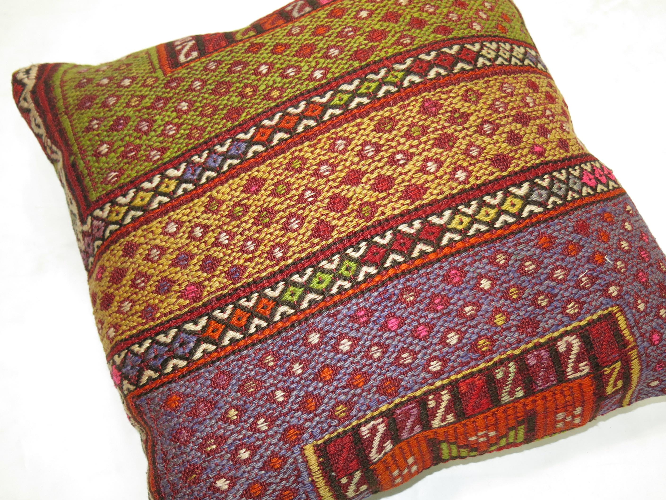 Pillow made from a Moroccan kilim.

19'' x 19''