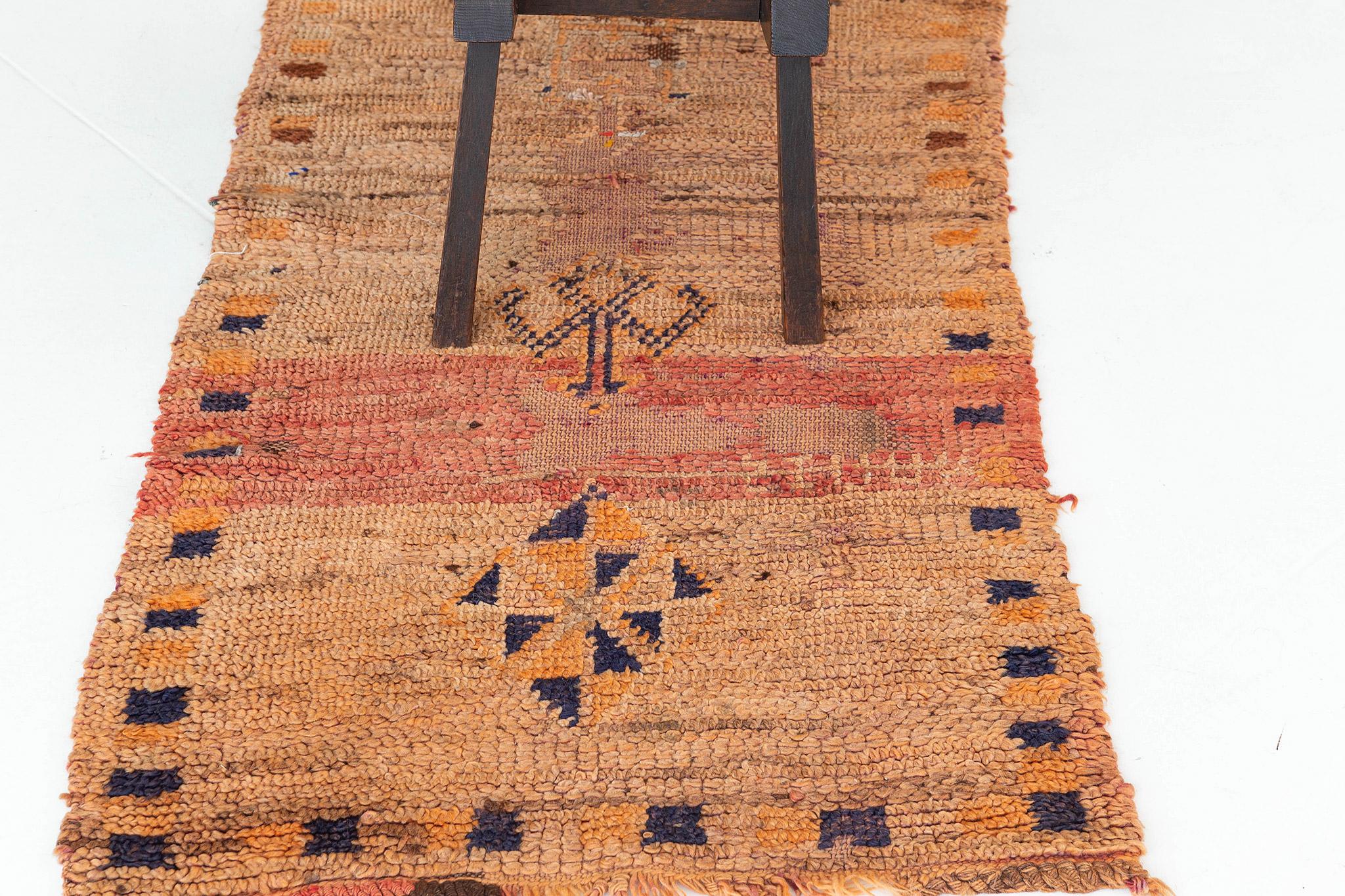 This magnificent Middle Atlas Tribe design consists of ambiguous Berber motifs and symbols. Each pattern symbolizes that telling the story of their tribe in a neutral scheme. A centerpiece that is perfect for your living room with ethnic
