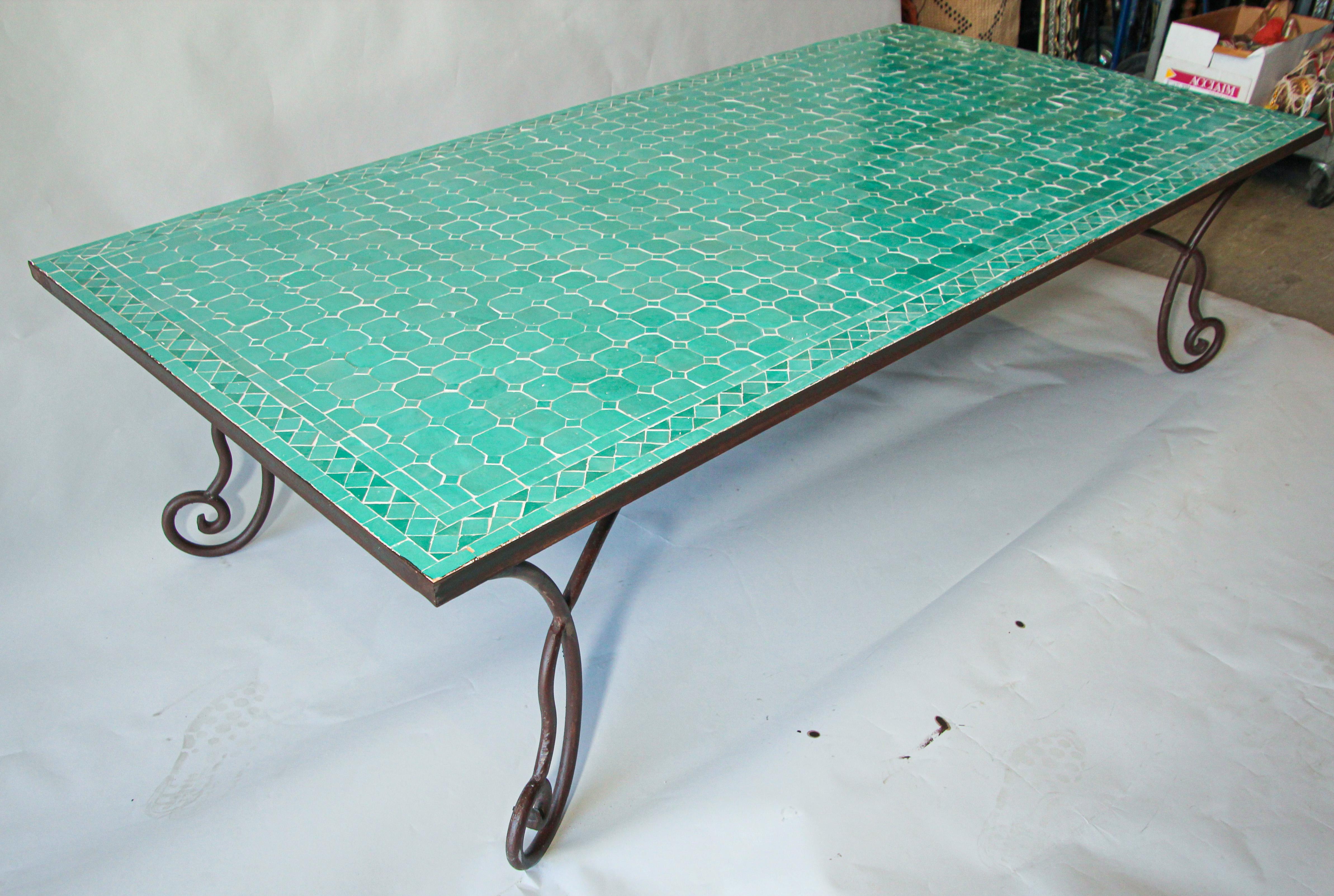 Handcrafted vintage mosaic tile tabletop, handmade using reclaimed Moroccan tiles of different shades of teal colors.
Moroccan glazed turquoise teal blue tiles.
Great Moroccan outdoor mosaic tile coffee table, delicately handcrafted in fez with