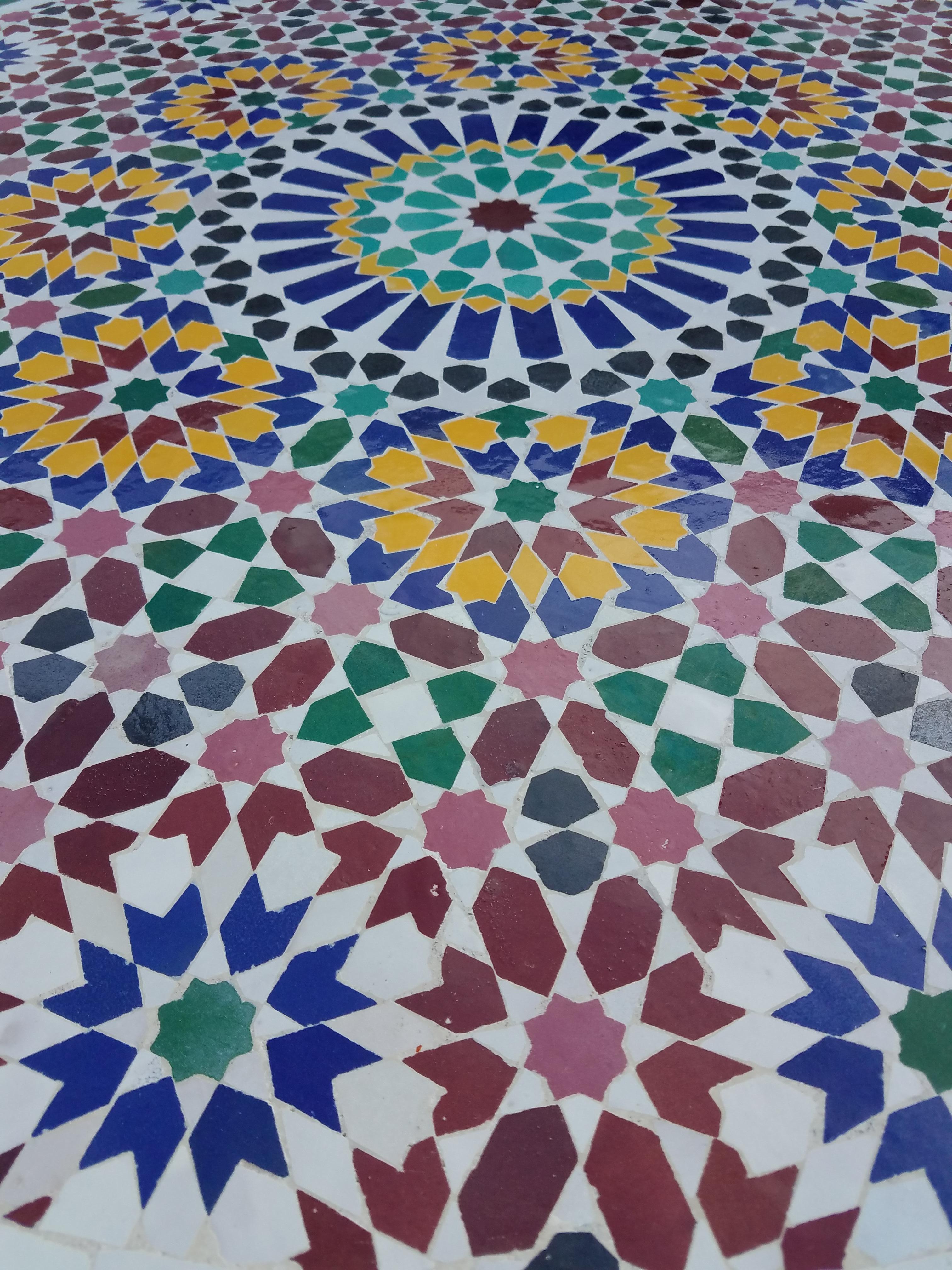 Multi-color custom-made Moroccan mosaic table measuring 48