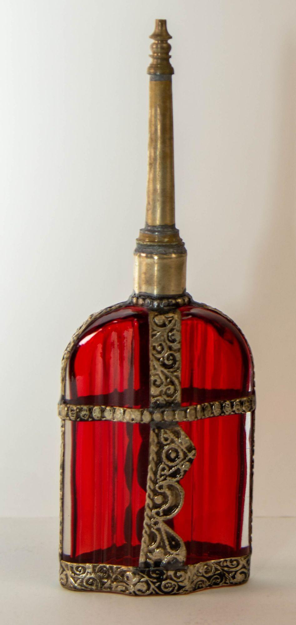 Hand-Crafted Moroccan Perfume Bottle Sprinkler with Embossed Metal Overlay and Red Glass For Sale