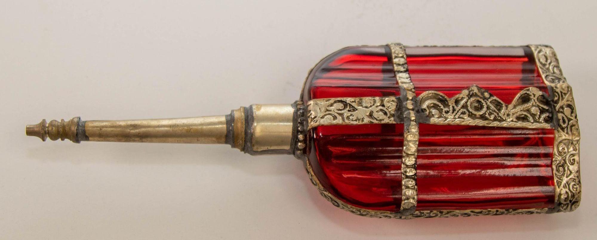 20th Century Moroccan Perfume Bottle Sprinkler with Embossed Metal Overlay and Red Glass