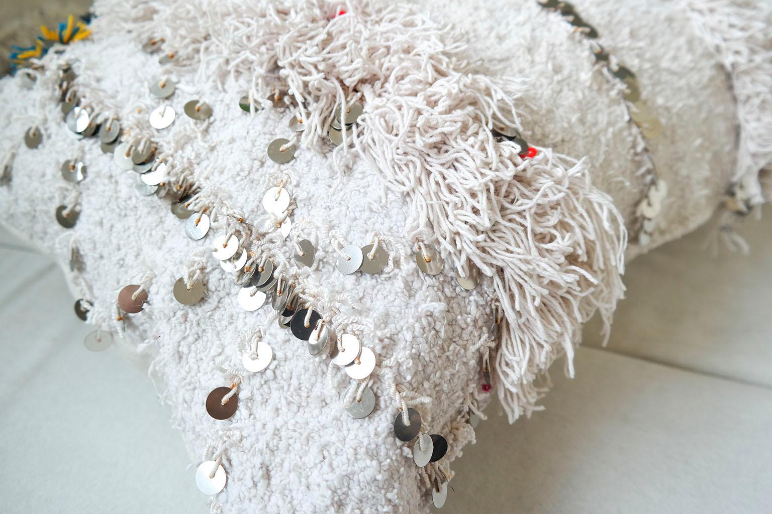 Gorgeous Moroccan wedding blanket pillow cover, refashioned from, by an El Ramla Hamra selected vintage wedding blanket

The story behind the Moroccan wedding blanket also called ''handira'' is beautiful. According to old Moroccan Berber tradition