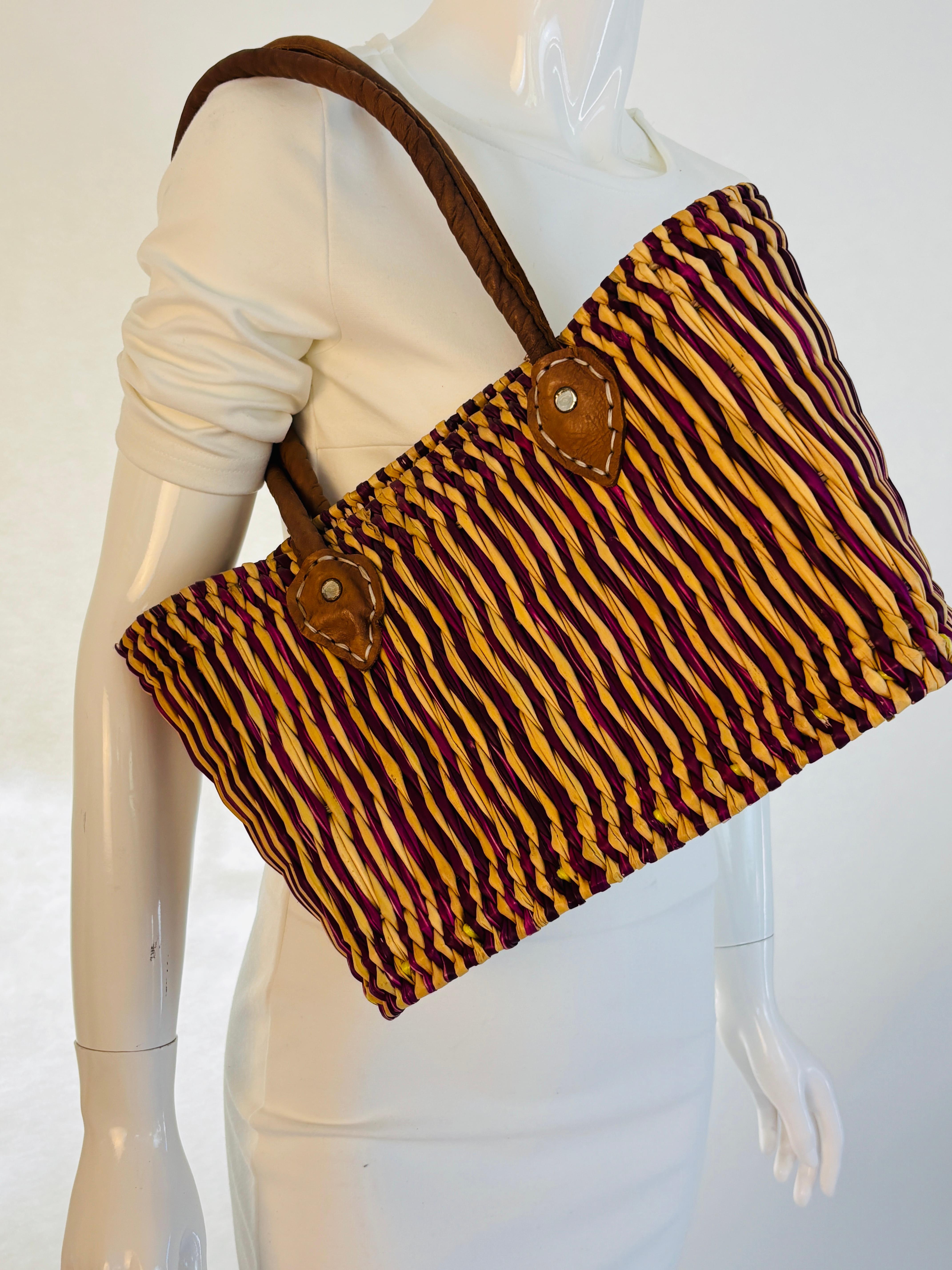 Vintage hand crafted raffia straw basket tote bag with leather handles.
Great to use at the beach, Ibiza Spain and St Tropez France stylish French Moroccan beach basket.
Or to shop at the Farmers Market in style.
Size: 11 