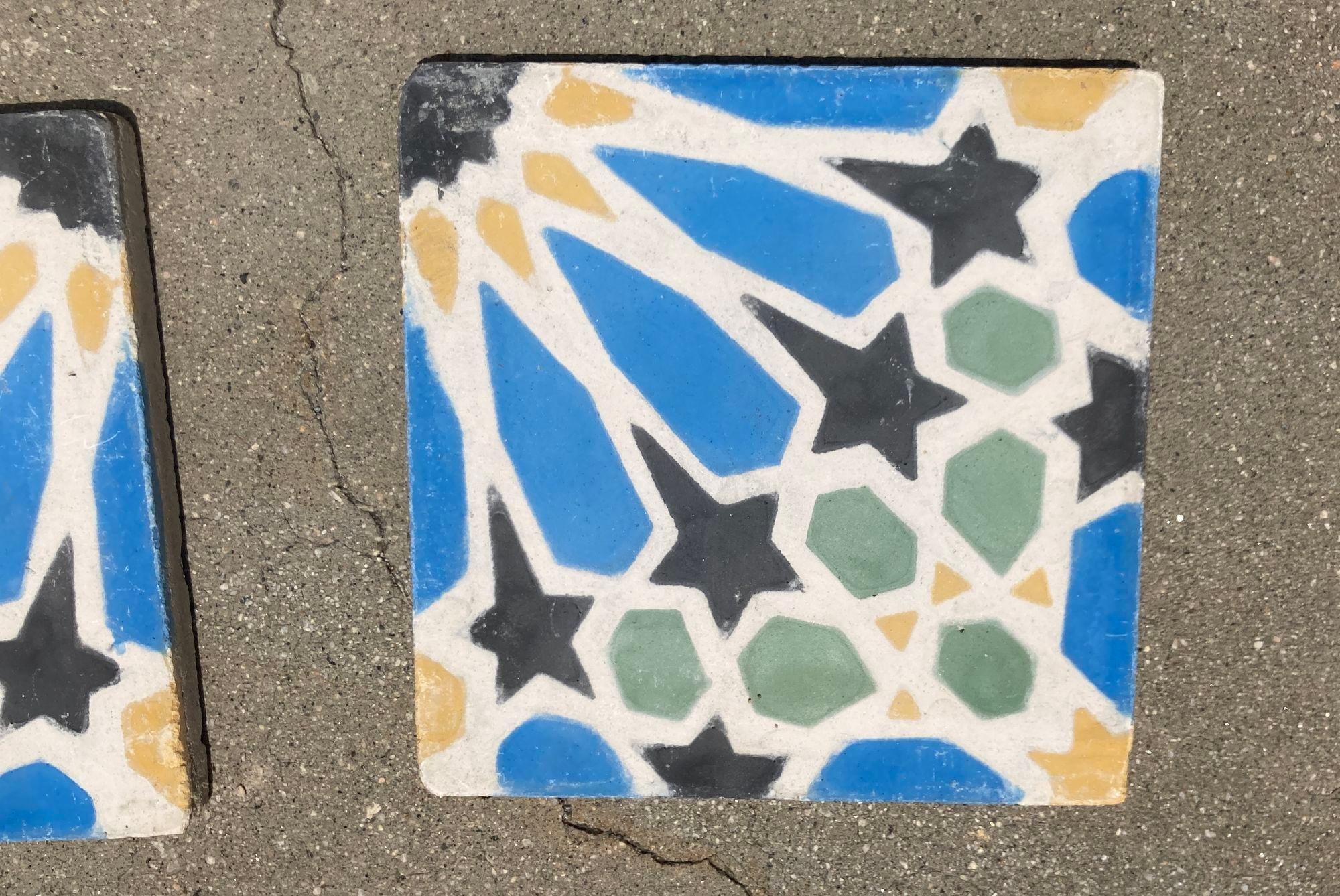 Moroccan Reclaimed Encaustic Cement Tile with Moorish Fez Design.
Moroccan handcrafted and hand-painted cement tiles with traditional Moorish colors.
These are authentic Moroccan reclaimed encaustic tiles hand made by artisans in Fez