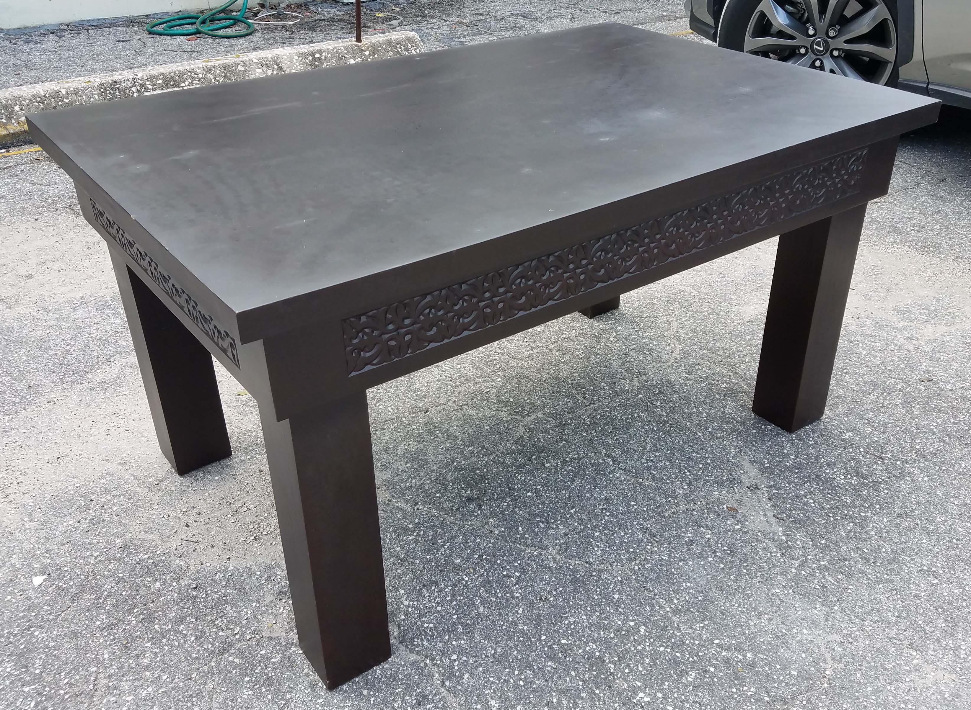 Very exotic Moroccan wooden coffee table. Rectangular shape and offers an amazing look. With its detailed carving along the sides, this side table will sure be a excellent add-on to your décor. It measures approximately 47