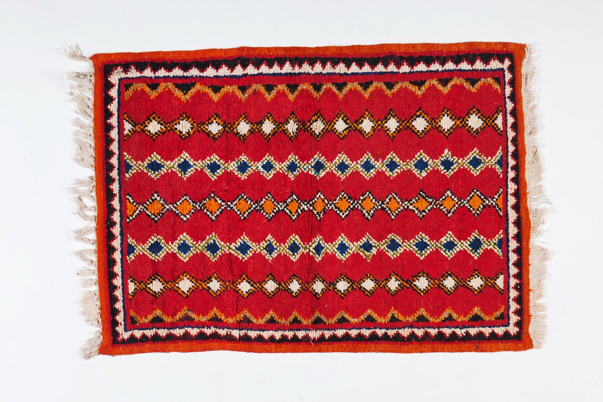 Moroccan red small rug, a pair
A dazzling and distinctive addition to your living room, dining room, entryway or bedroom, these rugs and their bold, captivating pattern will never go out of style

Handwoven carpet from the Taznacht region of