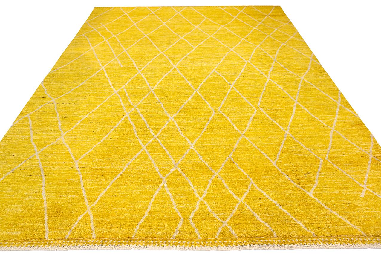 This is a Moroccan rug Hand-knotted Piece, an exquisite masterpiece handcrafted generously sized at 251 x 322 CM. This rug is not just a floor covering; it's a testament to the enduring legacy of Moroccan craftsmanship and the timeless allure of its