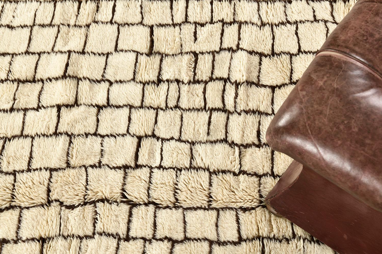 Be fascinated by this luxurious carpet from Morroco. lt has ambiguous Berber symbol and brick patterns through the natural light brown rug and showcases the design in outlined-contrast which made it more unique. Sink your feet from our Middle Atlas