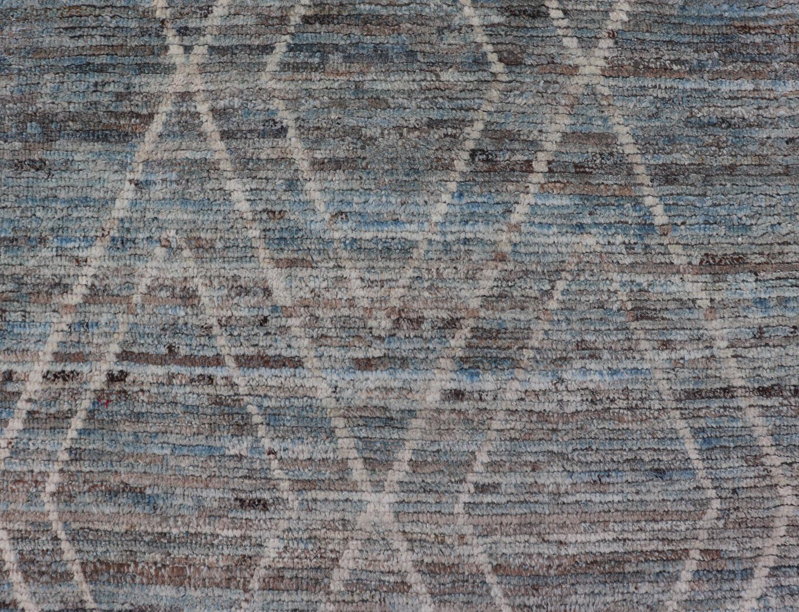 Measures: 3'2 x 11'0 
 Moroccan Runner in Cream and Sky Blue by Keivan Woven Arts. rug AFG-39459, country of origin / type: Afghanistan / Modern, condition: new. Keivan Woven Arts. 

The rug's background is a soothing blend of blue tones, overlaid
