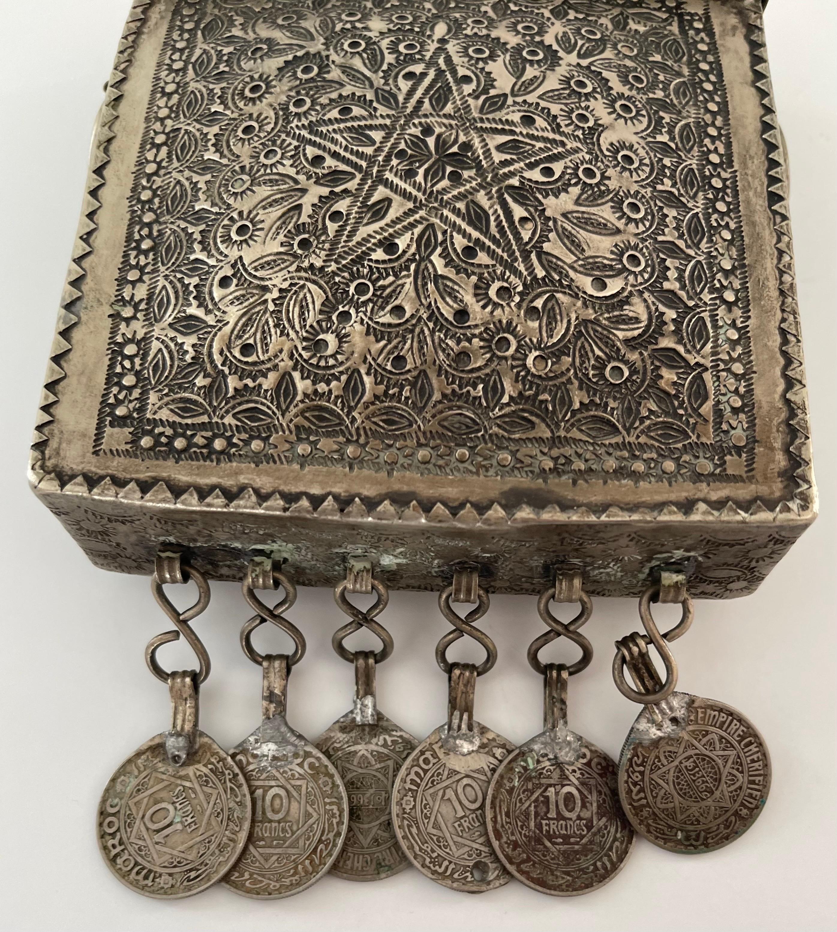 Antique Moroccan silver coin purse. Attached hanging coin detailing. As found condition with light overall wear from age and use. 