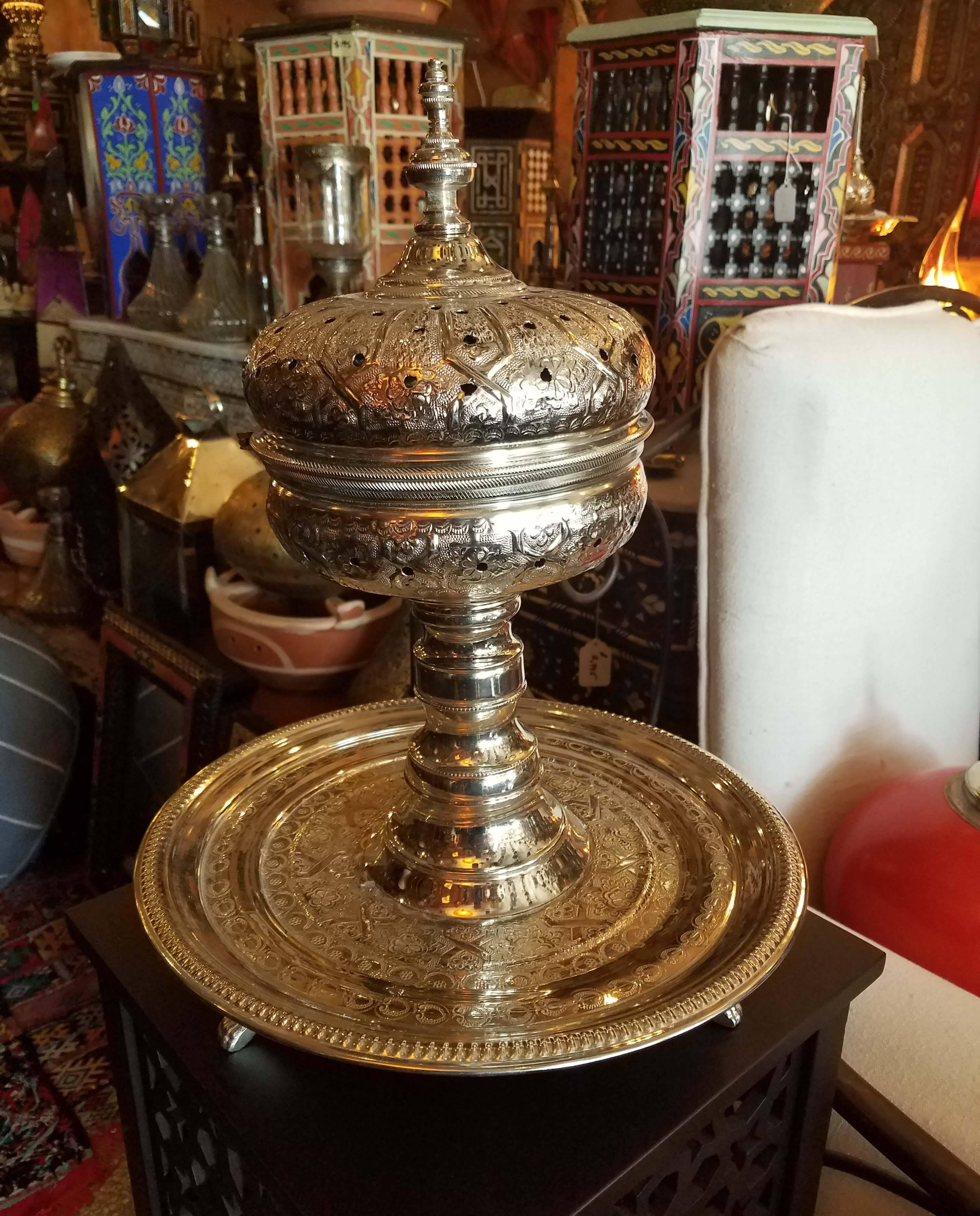 Just arrived! A beautiful Moroccan silver plated incense burner made in Casablanca. Used for a variety of purposes in Morocco, such as weddings ceremonies, baptisms, and other social and religious gatherings. Measuring approximately 17