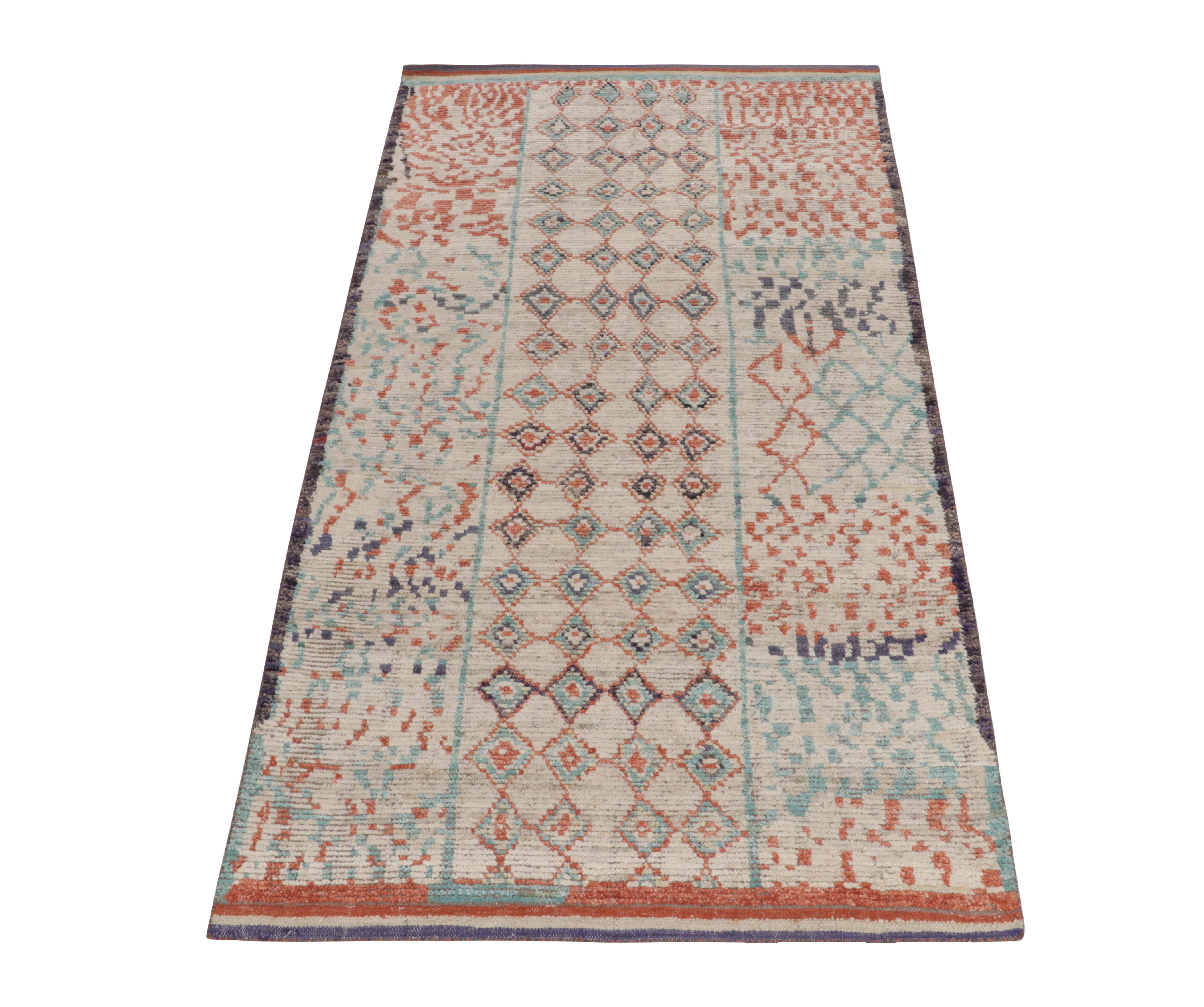 Rug & Kilim’s original ode to Moroccan rug design connoting tribal aesthetics. Carrying a luscious healthy pile, the rendering nurtures a series of diamond, criss cross & dotted patterns in light blue, tangerine atop comfortable beige concluding to