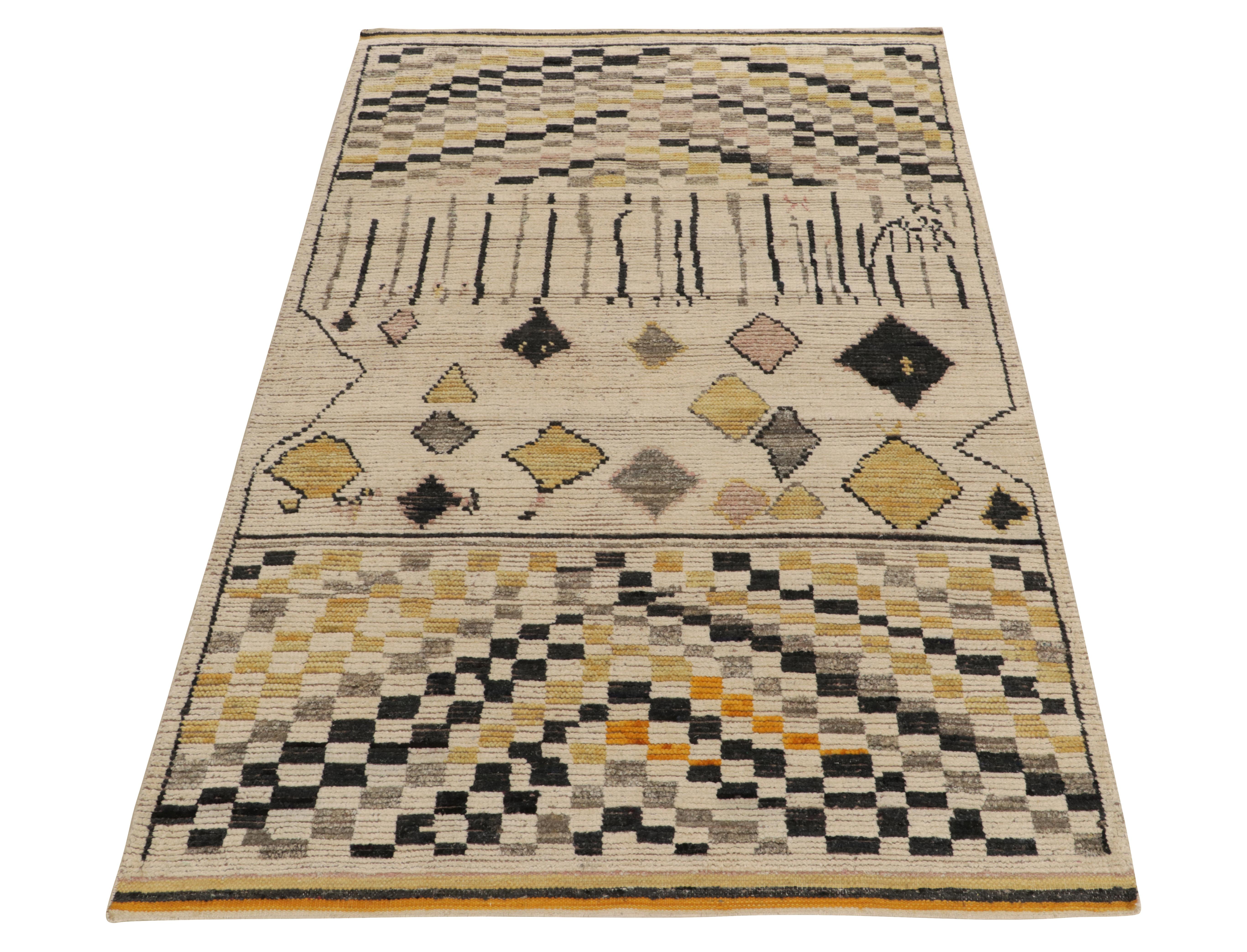 Rug & Kilim’s original tribute to Moroccan rug design connoting celebrated tribal aesthetics. Carrying a luscious healthy pile, the rendering features variegated diamond patterns in gold, gray & black atop off-white concluding to a multicolor