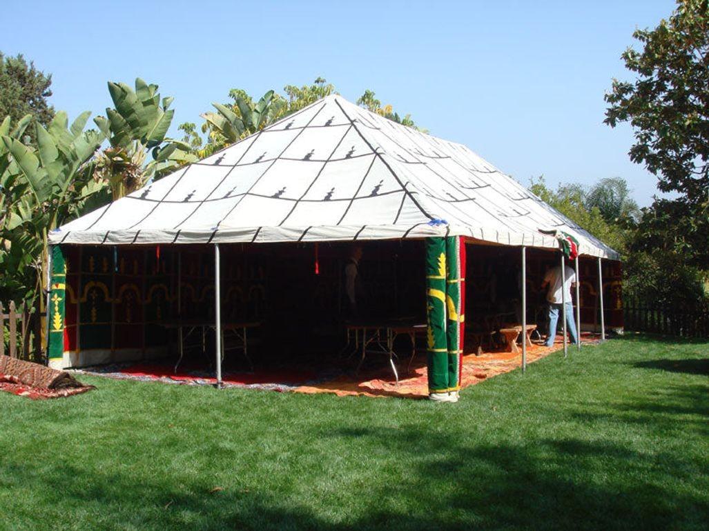 Moroccan traditional caidale tent are used outdoor for ceremonial events, wedding, parties.
For centuries the tribal people of Morocco's Atlas Mountains have passed down the art of hosting outdoor parties. In Northern Africa the caidale tents are
