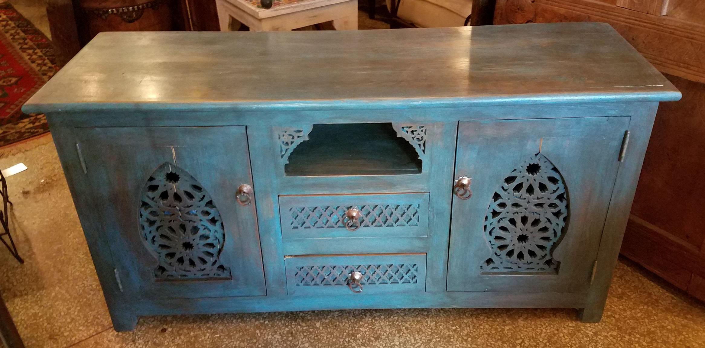One of the few Moroccan media stands we currently have in stock. This one is a very solid Cedar wood TV cabinet, with lots of storage space, and can be used as a TV stand, aquarium support base, blanket chest, or just stand alone as a show piece.
