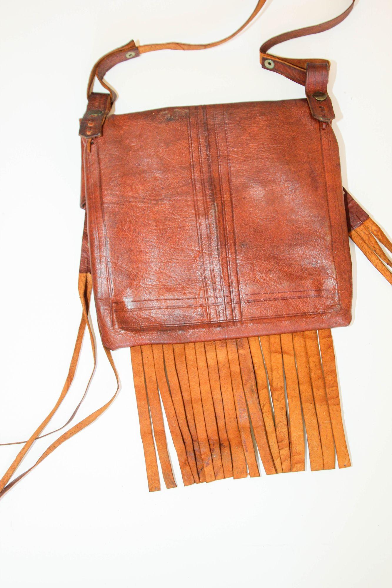 Moroccan Vintage Leather Handcrafted African Tuareg Bag with Fringes Wall Art In Good Condition For Sale In North Hollywood, CA