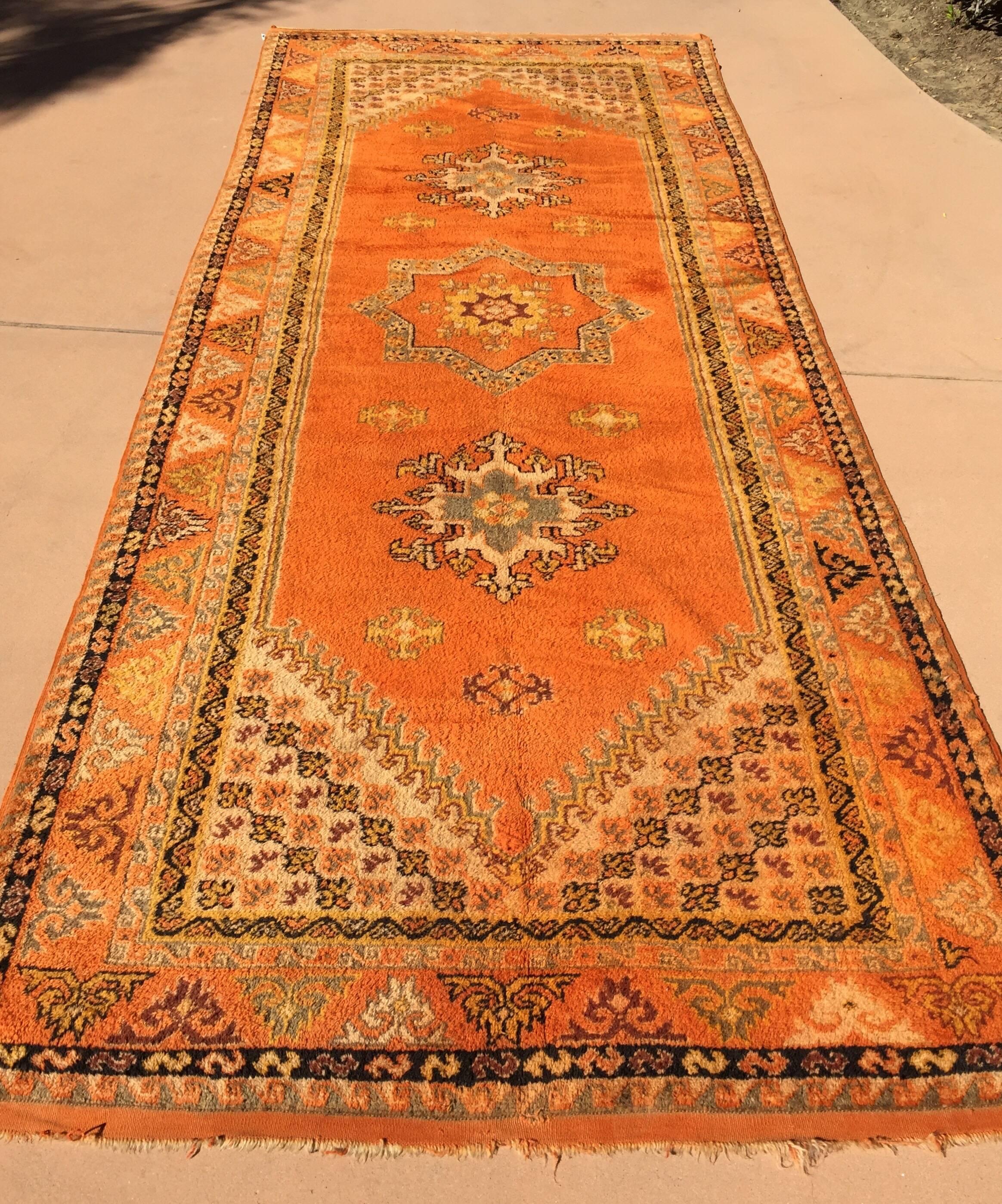 1960s authentic Moroccan vintage orange cor tribal African pile rug.Wonderf work of art, bright oranges geometrical design, free style, amazing vintage Moroccan runner.Handwoven by the Berber women in Morocco, organic lamb wo in vegetable