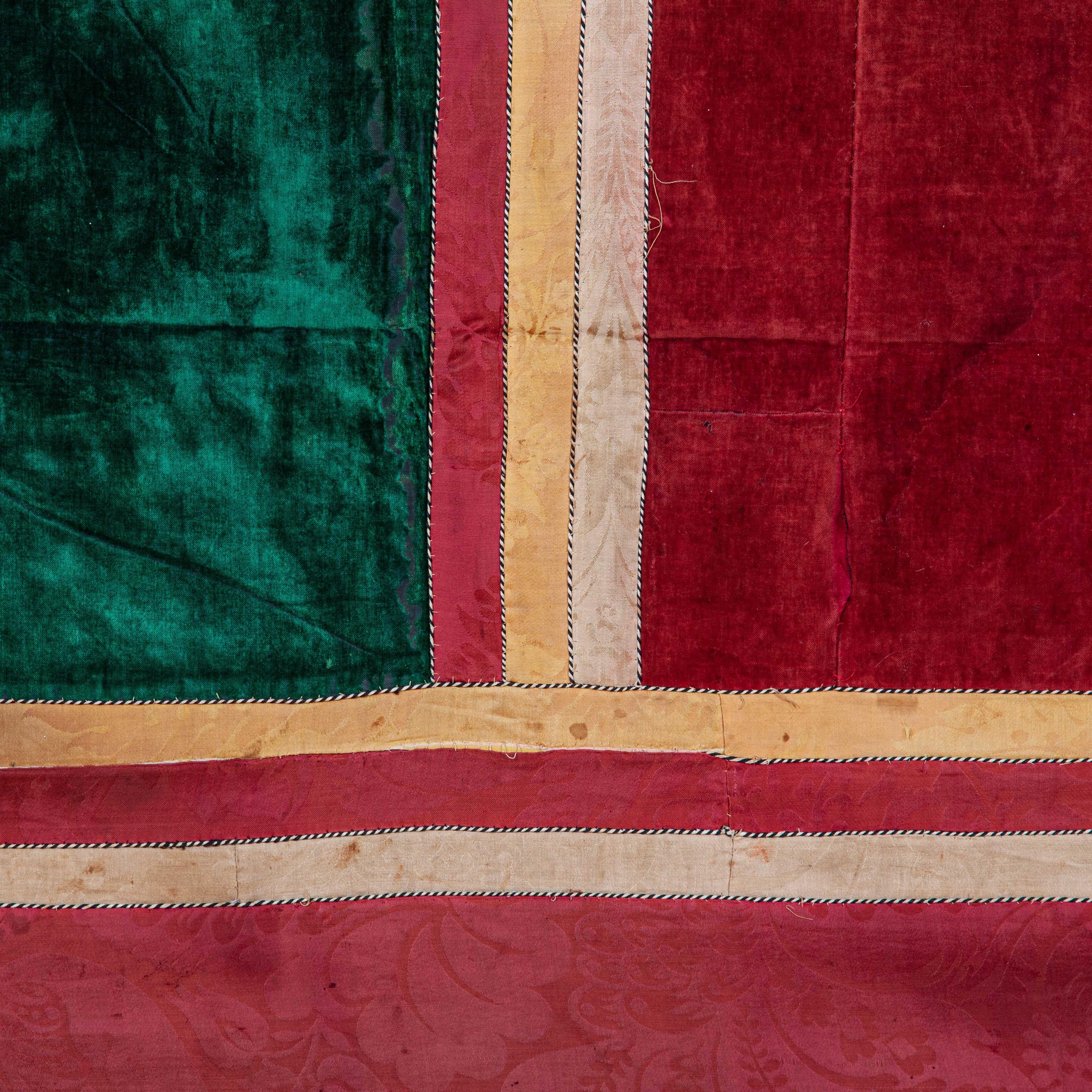 Panel is made of silk velvet and silk textiles, lined with heavy cotton.