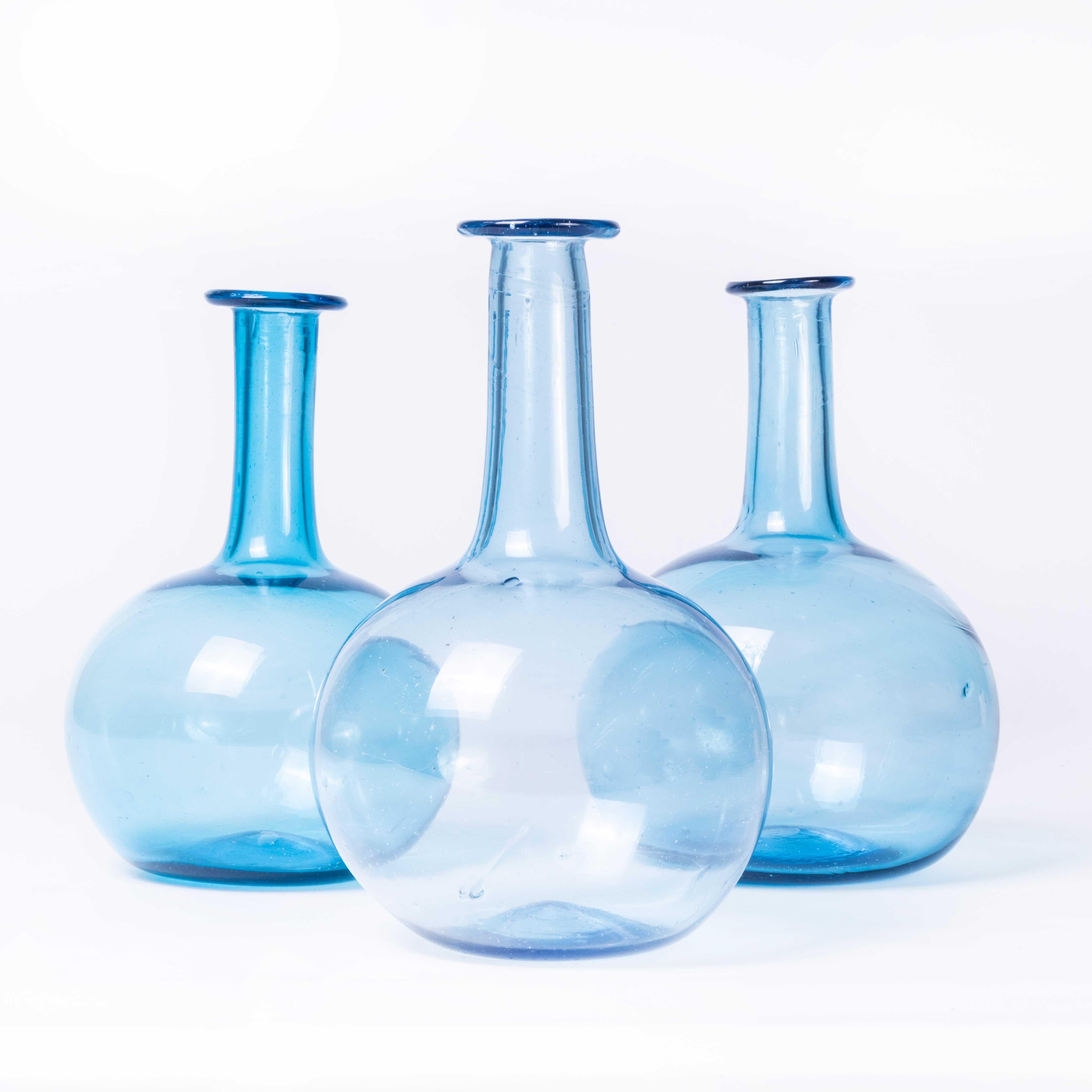 Moroccan Water Jug – Blue
Moroccan Water Jug – Blue. Hand-made in Morocco. The glass is mouth blown and available in a beautiful soft blue, due to the artisanal quality the colours may vary slightly. Listing is for one Jug.

WORKSHOP REPORT
Our