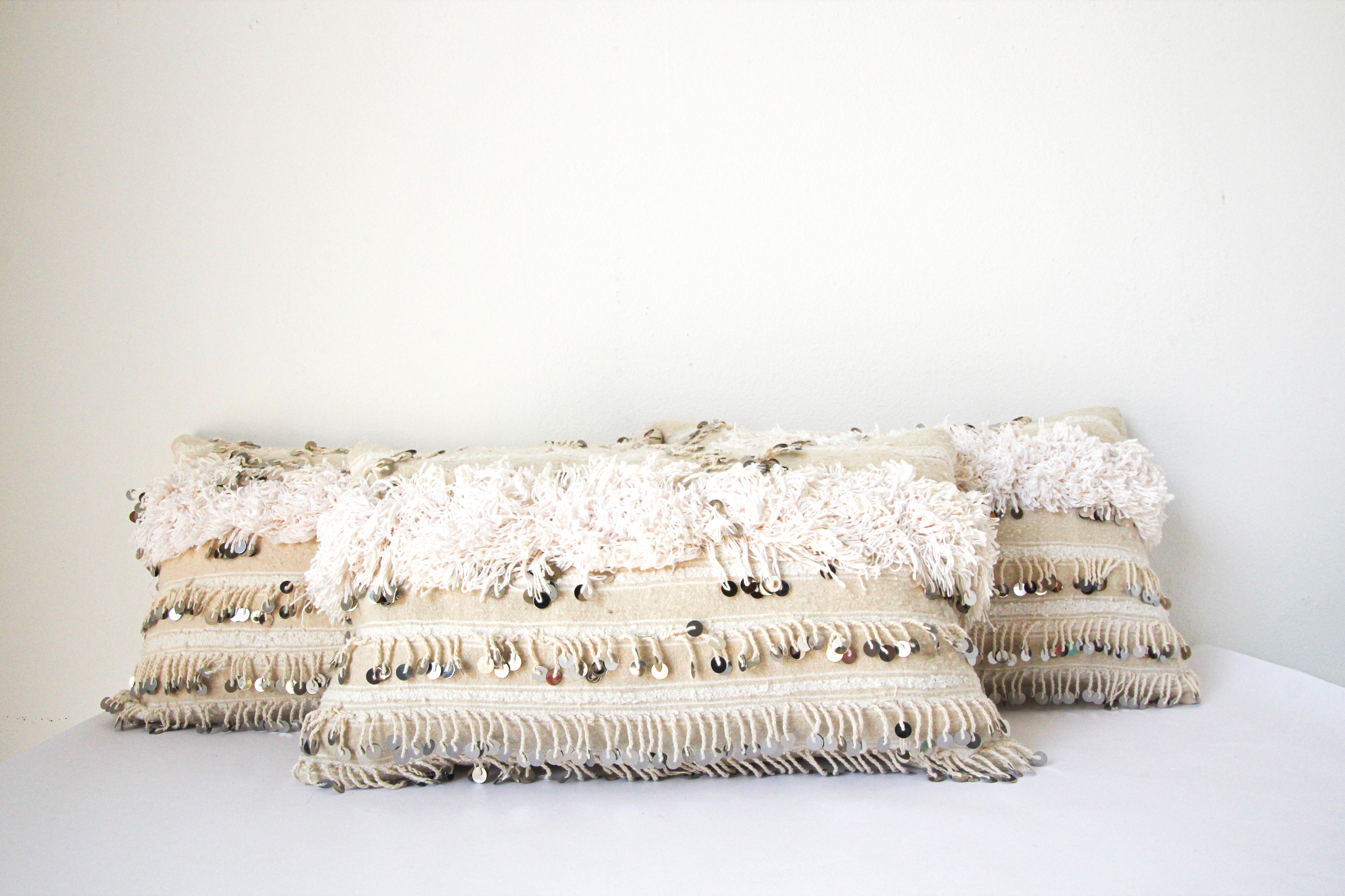 Vintage set of three original tribal Moroccan lumbar pillow.
Pillow handmade from a wedding textile throw with silver sequins and long fringes
Great Bohemian Hippie chic stylish Moroccan wedding throw pillow. Made from Traditional Moroccan Berber