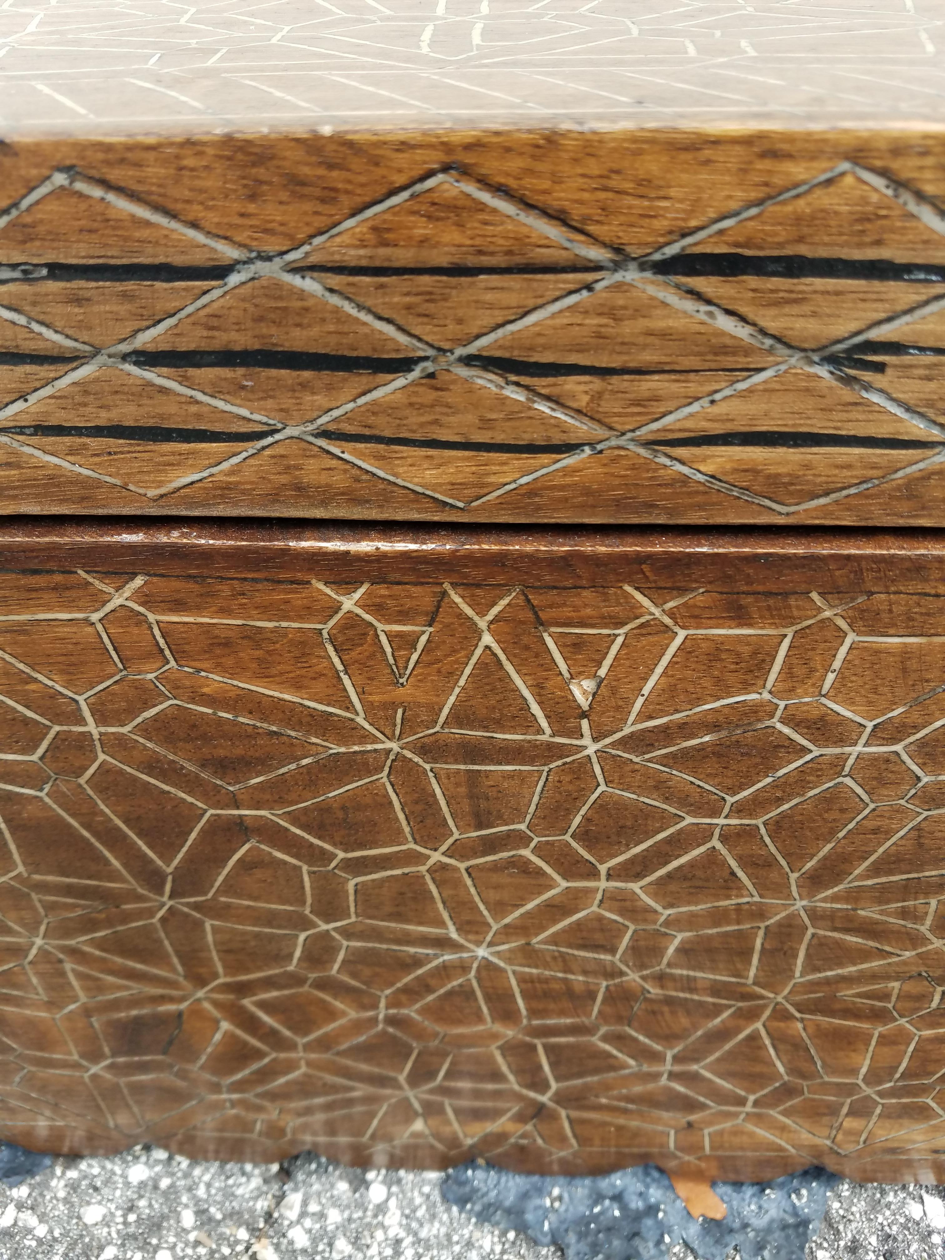 We carry a wide range of beautiful Moroccan trunks. This one is a very solid Cedar wood trunk, with some storage space, and can be used as an aquarium support base, blanket chest, or just Stand alone as a show piece. Amazing carvings throughout as