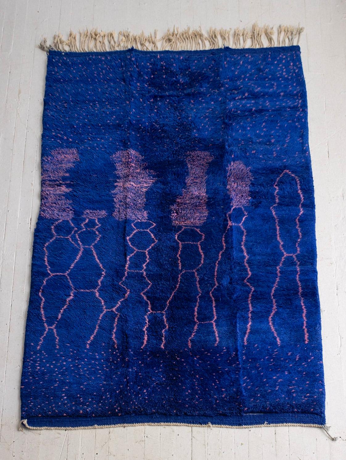 Hand knotted Moroccan wool rug. High pile shag. Graphic vibrant cobalt and pink pattern reminiscent of a night sky or evening landscape.