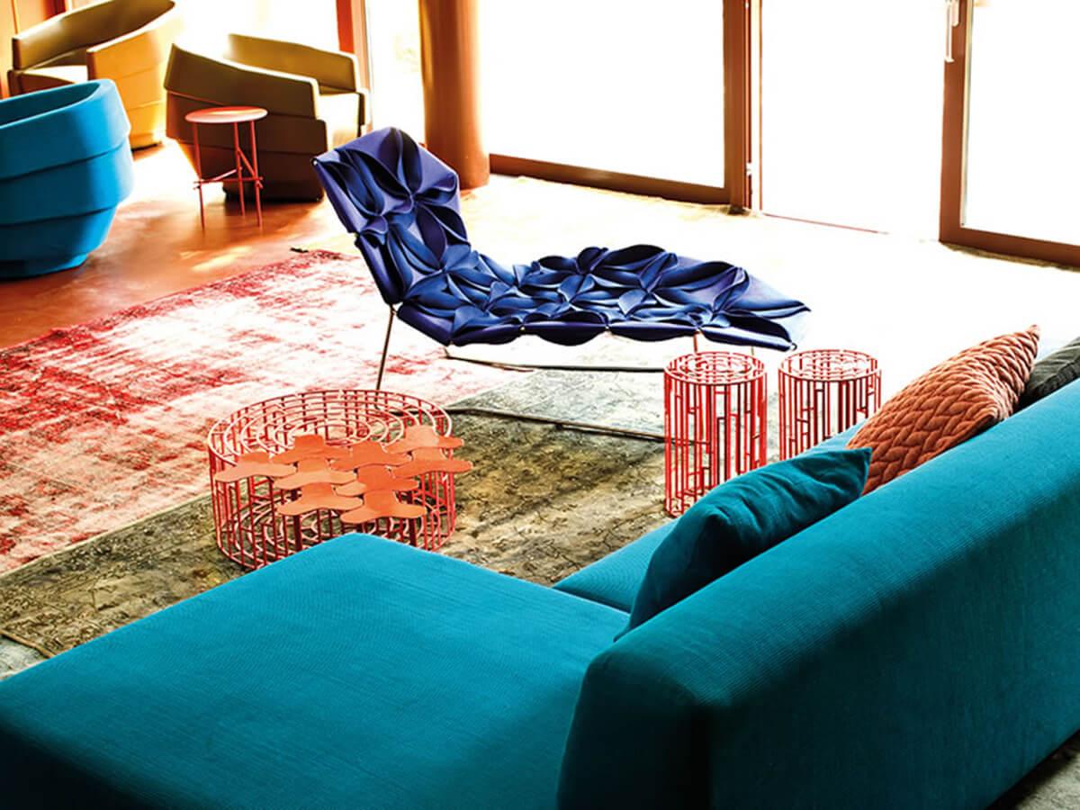 A new shape for a non-padded chair, three-dimensional geometry derived from the cellular genesis of sewn petals using the layout of a graphic structure with a triangular base. The result is a floral explosion, a marvellous symbolic display of