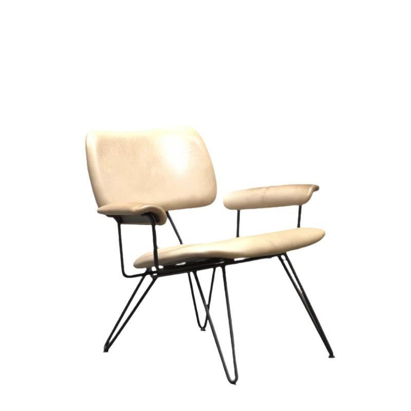 Lounge chair designed by Diesel for Moroso. The camel-skin colour leather seat, back and armrests are articulated by the supporting, varnished, black frame. The frame expresses its own function whilst adding to the aesthetic of the piece.   Made in
