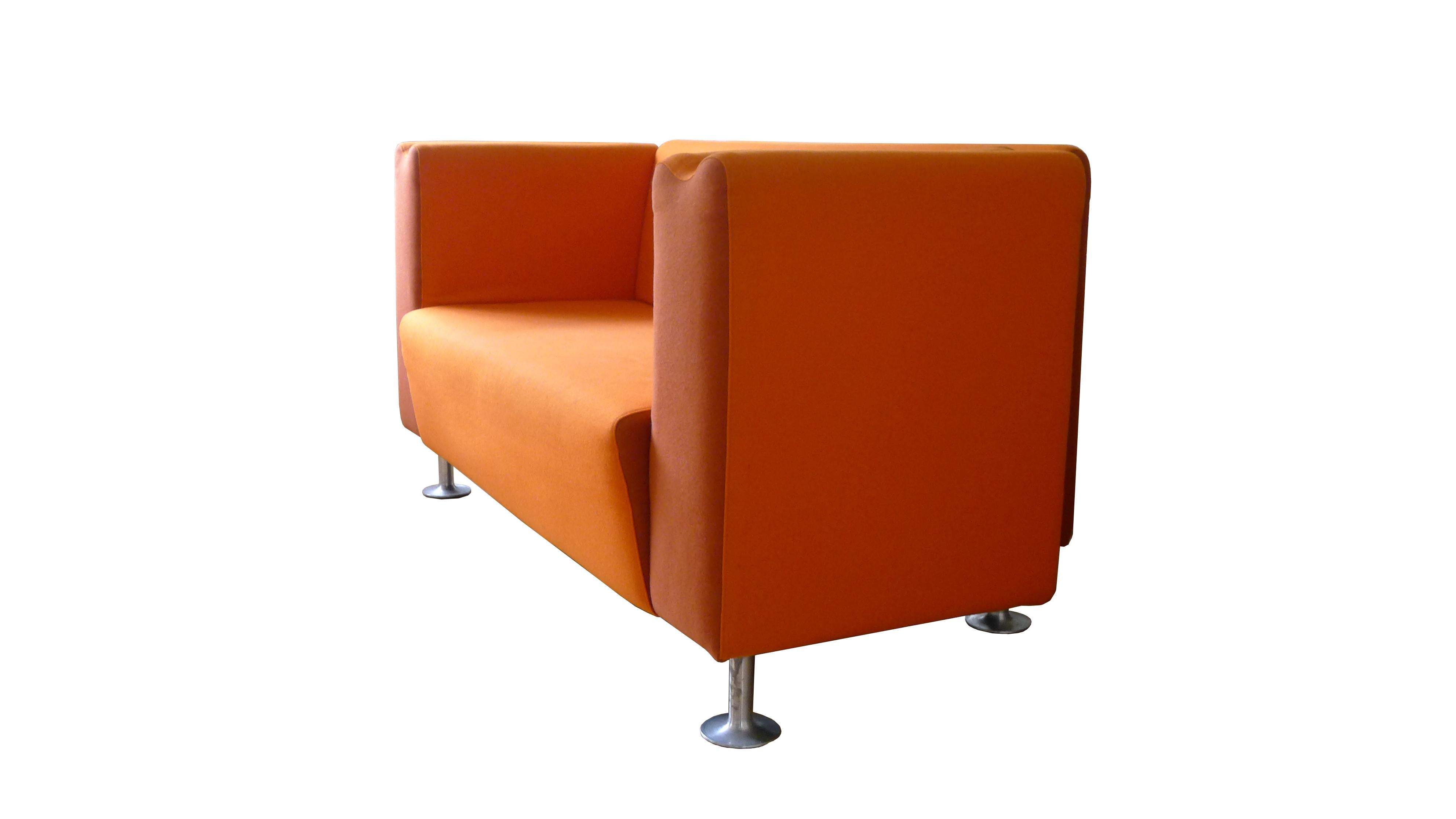 M Collection, Moroso by Ross Lovegrove, orange kvadrat wool with darker orange panels and aluminium feet. 
The sculpture detail of the 