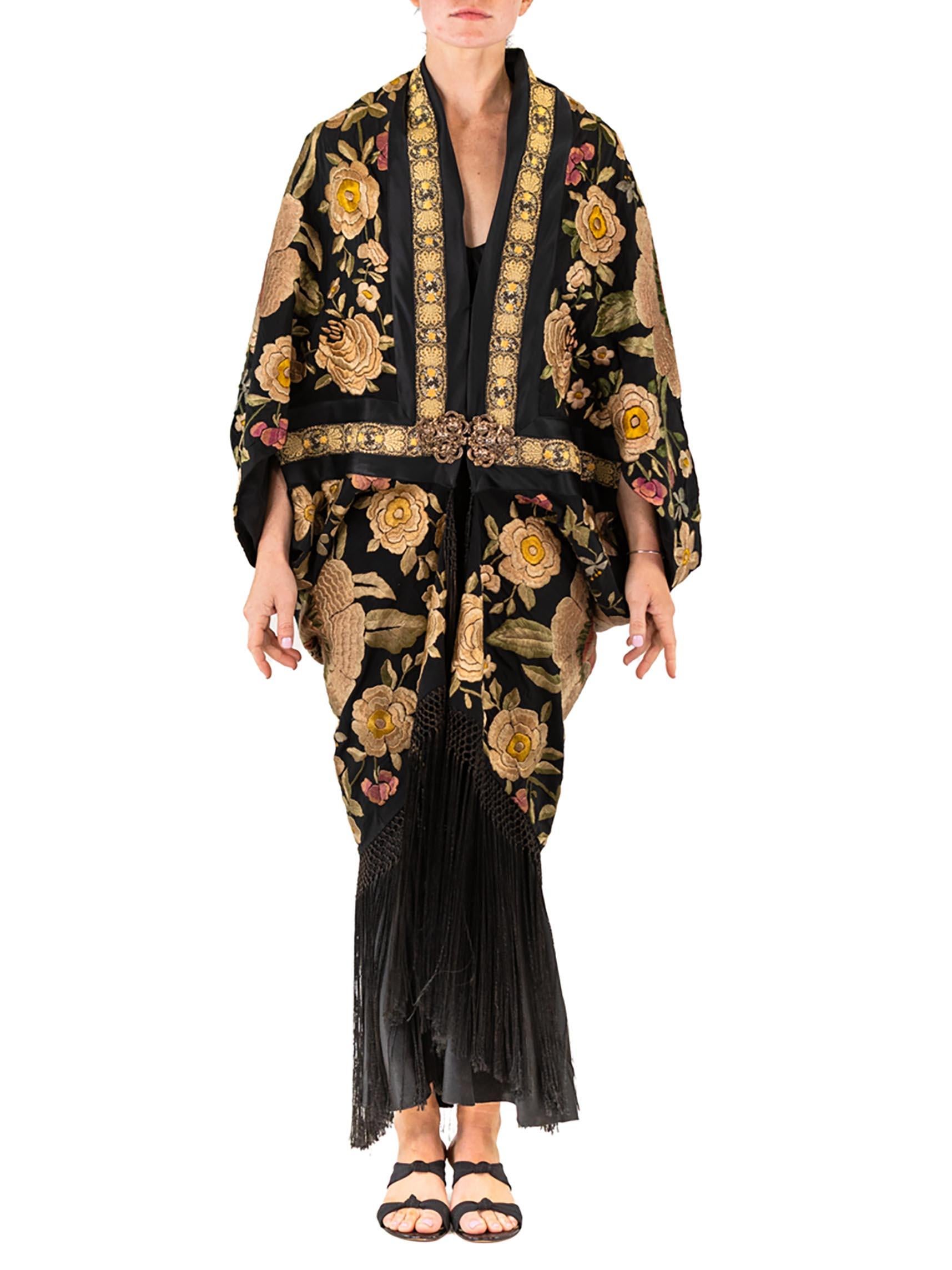 Inspired by the works of Paul Poiret. Each Morphew Collection Cocoon is made from an antique piano shawl. Each piece beautifully embroidered in silk threads by hand nearly 100 years ago. Made in New York we drape, pleat and don’t cut each piece into