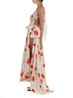 MORPHEW ATELIER Cream & Red Poly/Lurex Lamé Cut-Out Gown With High Slit Bow
