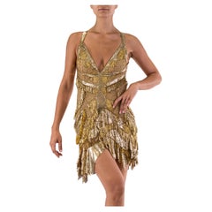 MORPHEW ATELIER Goldfarbenes Cocktailkleid aus Spitze und Metallgeflecht mit Fransen
