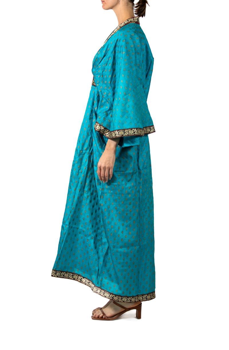 Morphew Collection Azure Blue & Gold Indian Sari Silk Butterfly Sleeve Kaftan Dress
MORPHEW COLLECTION is made entirely by hand in our NYC Ateliér of rare antique materials sourced from around the globe. Our sustainable vintage materials represent
