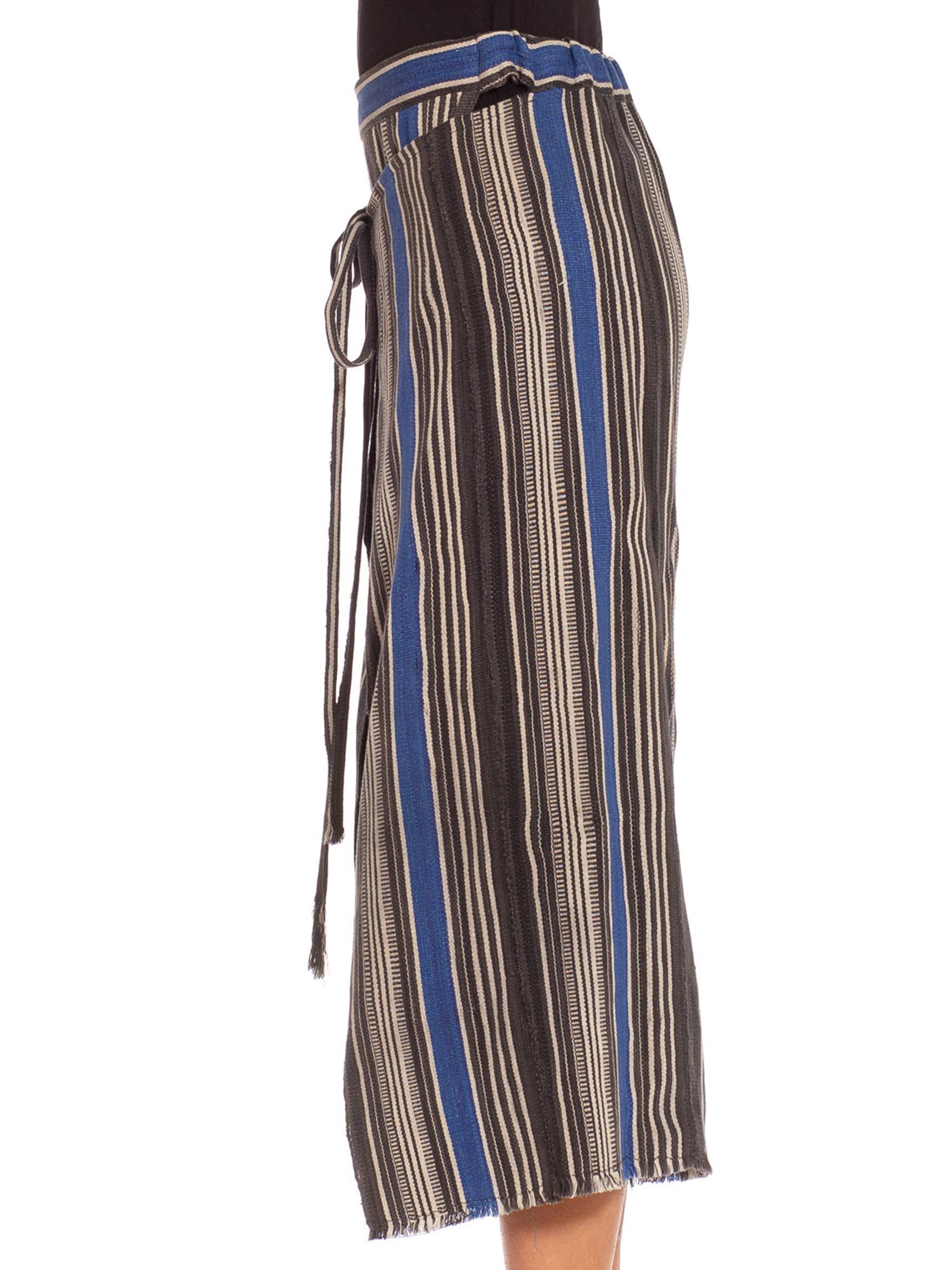 MORPHEW COLLECTION Black & Blue Cotton Handwoven Hand-Dyed African Indigo Wrap Pants
MORPHEW COLLECTION is made entirely by hand in our NYC Ateliér of rare antique materials sourced from around the globe. Our sustainable vintage materials represent