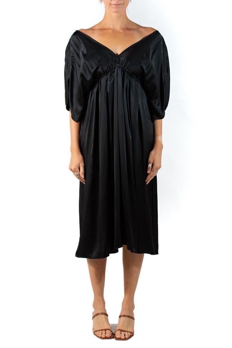 Made with an Empire elasticated wiast ad kimono sleeves, this dress is size inclusive and looks great on an array of body sizes. Dressed down as a swim coverup or at home loungewear, or styled with a belt and heels for dinner.  Morphew Collection