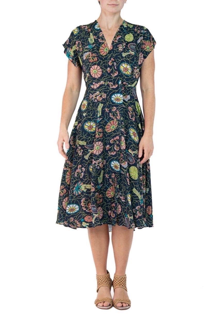 Morphew Collection Blue Cherry Blossom Novelty Print Cold Rayon Bias Dress Master Medium
MORPHEW COLLECTION is made entirely by hand in our NYC Ateliér of rare antique materials sourced from around the globe. Our sustainable vintage materials