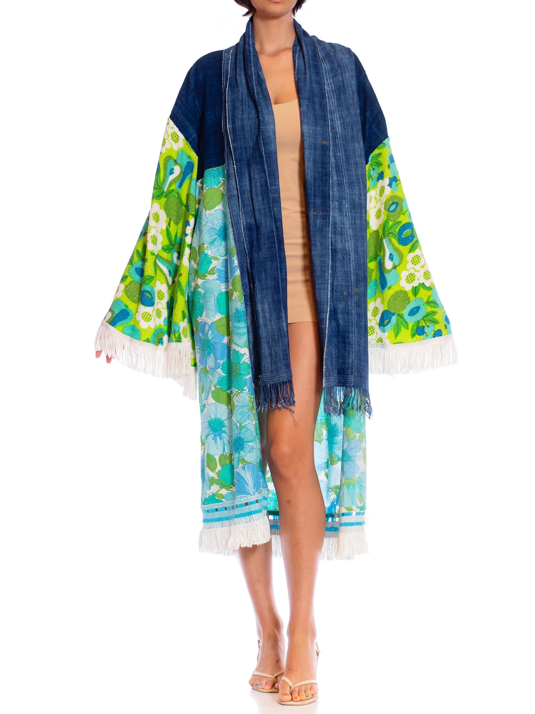 This piece is made with west African indigo pieced together with floral fabrics from the 1970s. Terry cloth butterfly sleeves finished off with fun vintage cotton fringe MORPHEW COLLECTION Blue & Green African Indigo Vintage 70S Floral Duster Beach