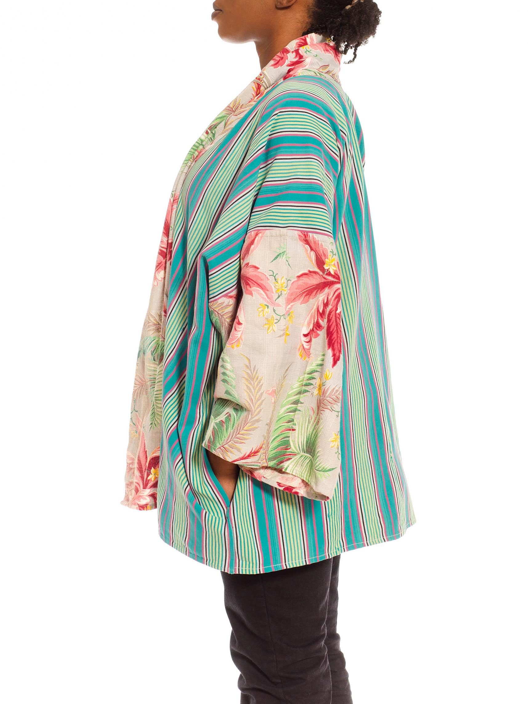 Made from vintage fabrics so small areas of wear or vintage repairs are expected and add to the story of the piece. Morphew Collection Blue & Pink Cotton African Stripe 1940S Tropical Duster 
MORPHEW COLLECTION is made entirely by hand in our NYC