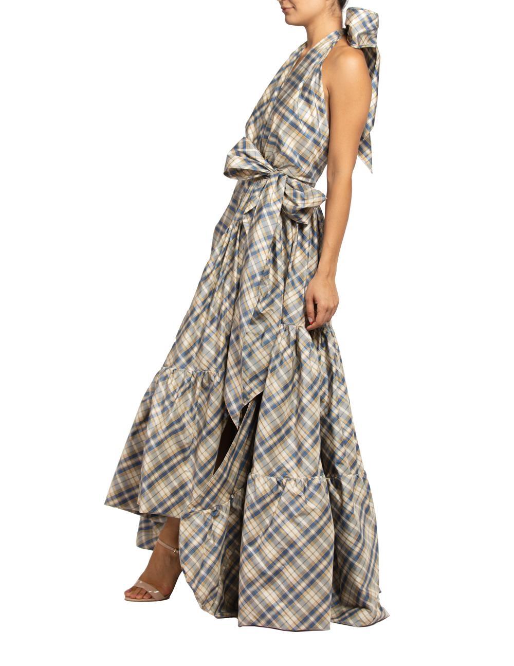 MORPHEW COLLECTION Blue & Yellow Silk Taffeta Plaid Gown MASTER
MORPHEW COLLECTION is made entirely by hand in our NYC Ateliér of rare antique materials sourced from around the globe. Our sustainable vintage materials represent over a century of