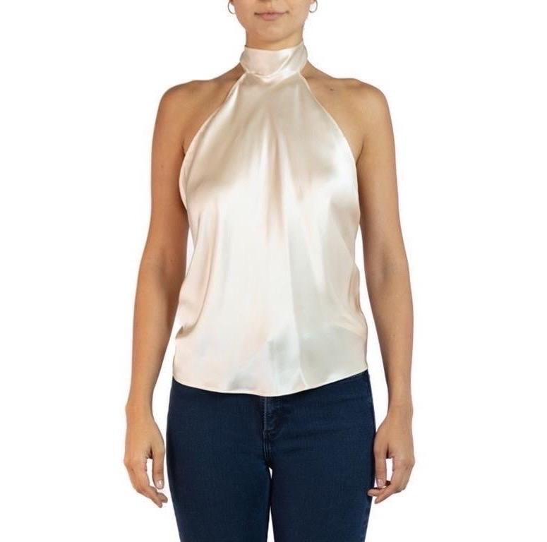 Morphew Collection Champagne Charmeuse Halter Tie Scarf Top
MORPHEW COLLECTION is made entirely by hand in our NYC Ateliér of rare antique materials sourced from around the globe. Our sustainable vintage materials represent over a century of design,