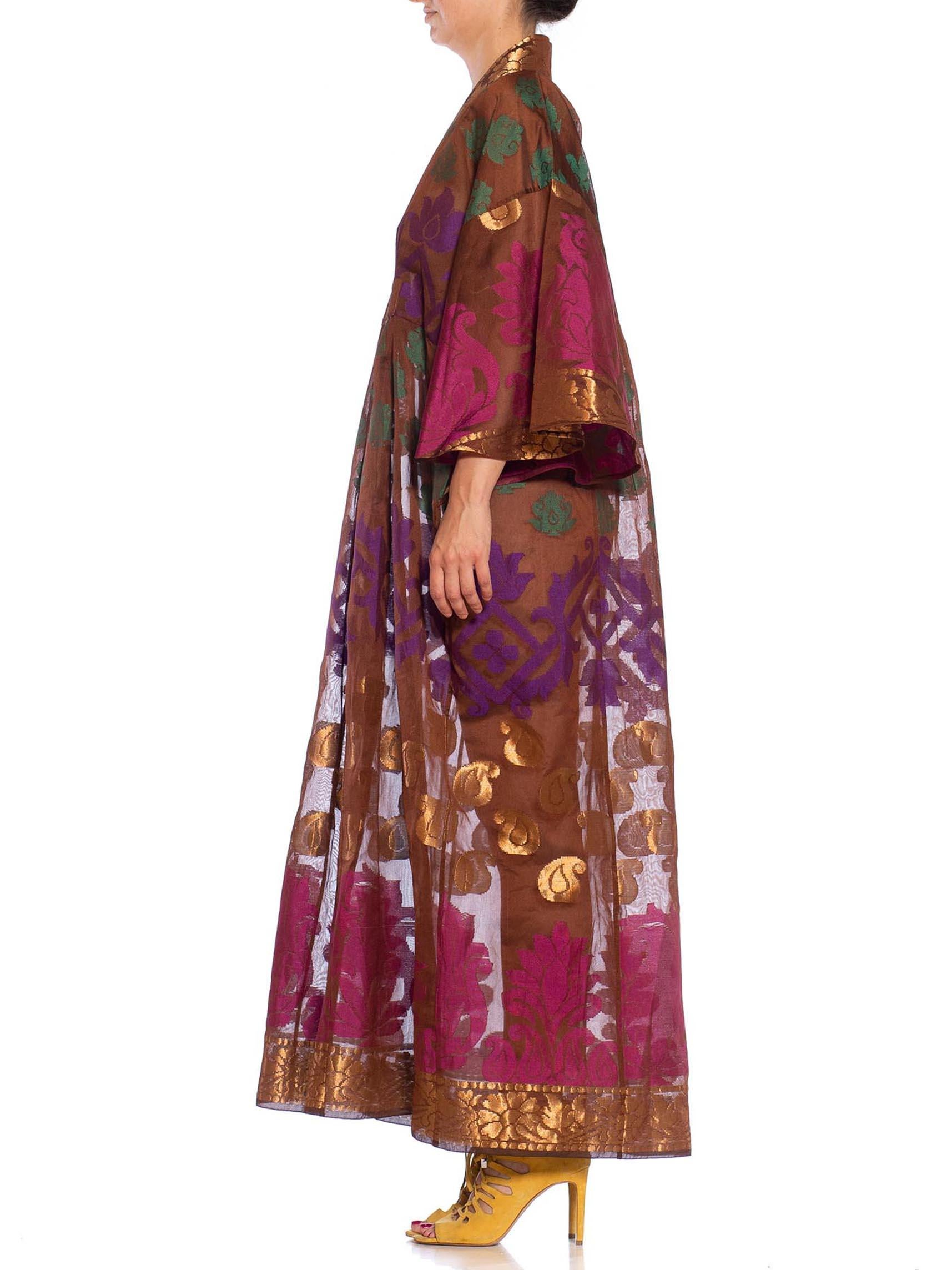 MORPHEW COLLECTION Chocolate Brown Metallic Multi  Silk Kaftan Made From Vintage Saris
MORPHEW COLLECTION is made entirely by hand in our NYC Ateliér of rare antique materials sourced from around the globe. Our sustainable vintage materials