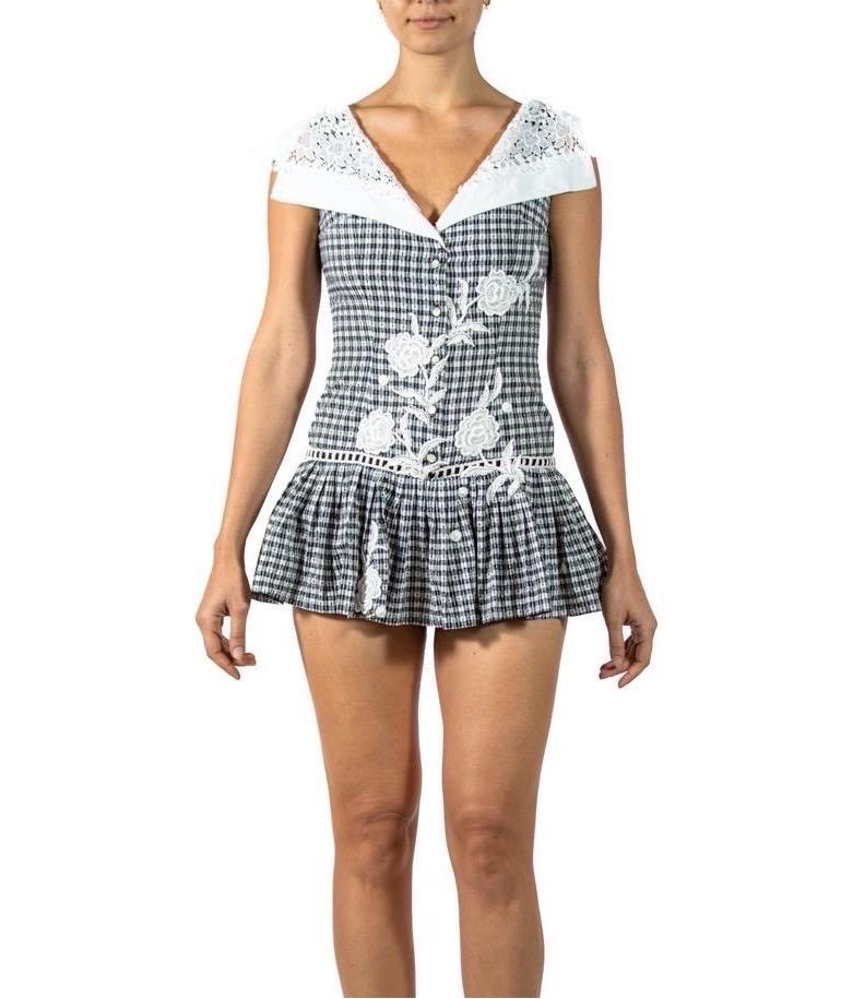Made from vintage 1940s & 60s lace and a vintage 1950s sunsuit with attached skirt. MORPHEW COLLECTION Cotton Gingham & Lace  Romper 
MORPHEW COLLECTION is made entirely by hand in our NYC Ateliér of rare antique materials sourced from around the