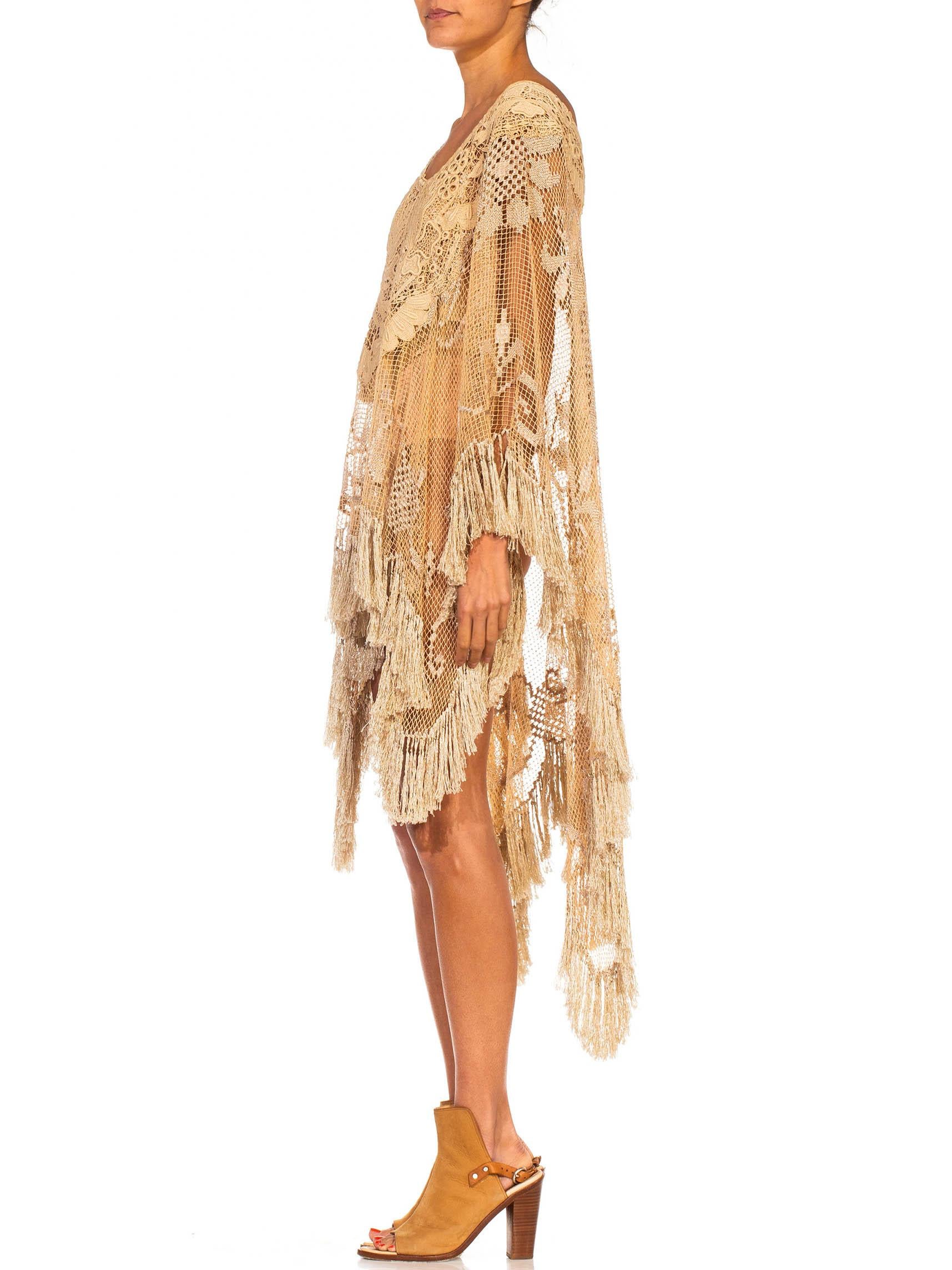 MORPHEW COLLECTION Ecru Edwardian Hand Made Cotton & Rayon Fringed Lace Kaftan Tunic
MORPHEW COLLECTION is made entirely by hand in our NYC Ateliér of rare antique materials sourced from around the globe. Our sustainable vintage materials represent