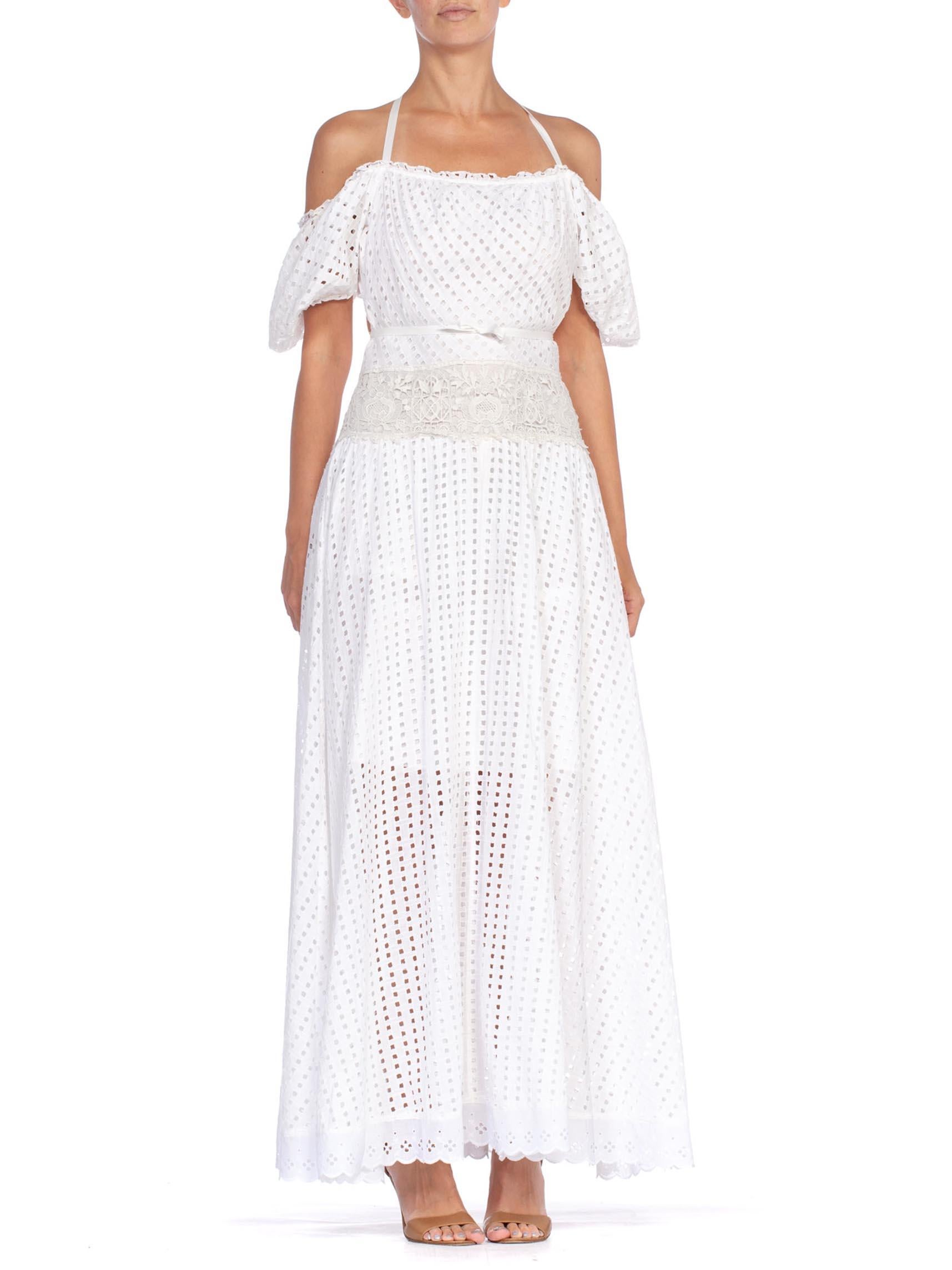 MORPHEW COLLECTION White Organic Cotton Backless Off Shoulder Maxi Dress Made From Victorian & 1930'S Lace
MORPHEW COLLECTION is made entirely by hand in our NYC Ateliér of rare antique materials sourced from around the globe. Our sustainable