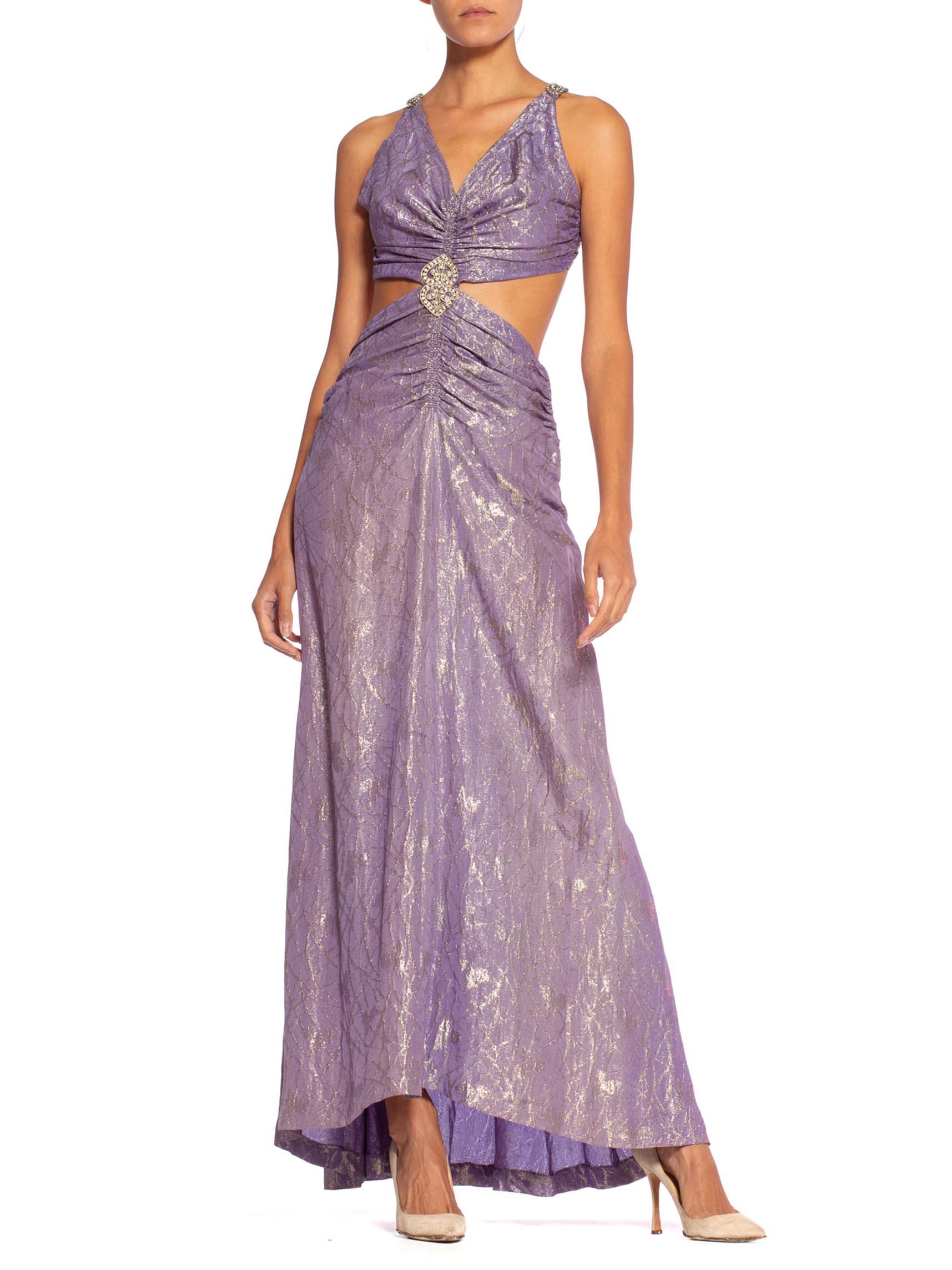 MORPHEW COLLECTION Lilac Silver Antique Silk Lamé  Gown With 1930S Crystals
MORPHEW COLLECTION is made entirely by hand in our NYC Ateliér of rare antique materials sourced from around the globe. Our sustainable vintage materials represent over a