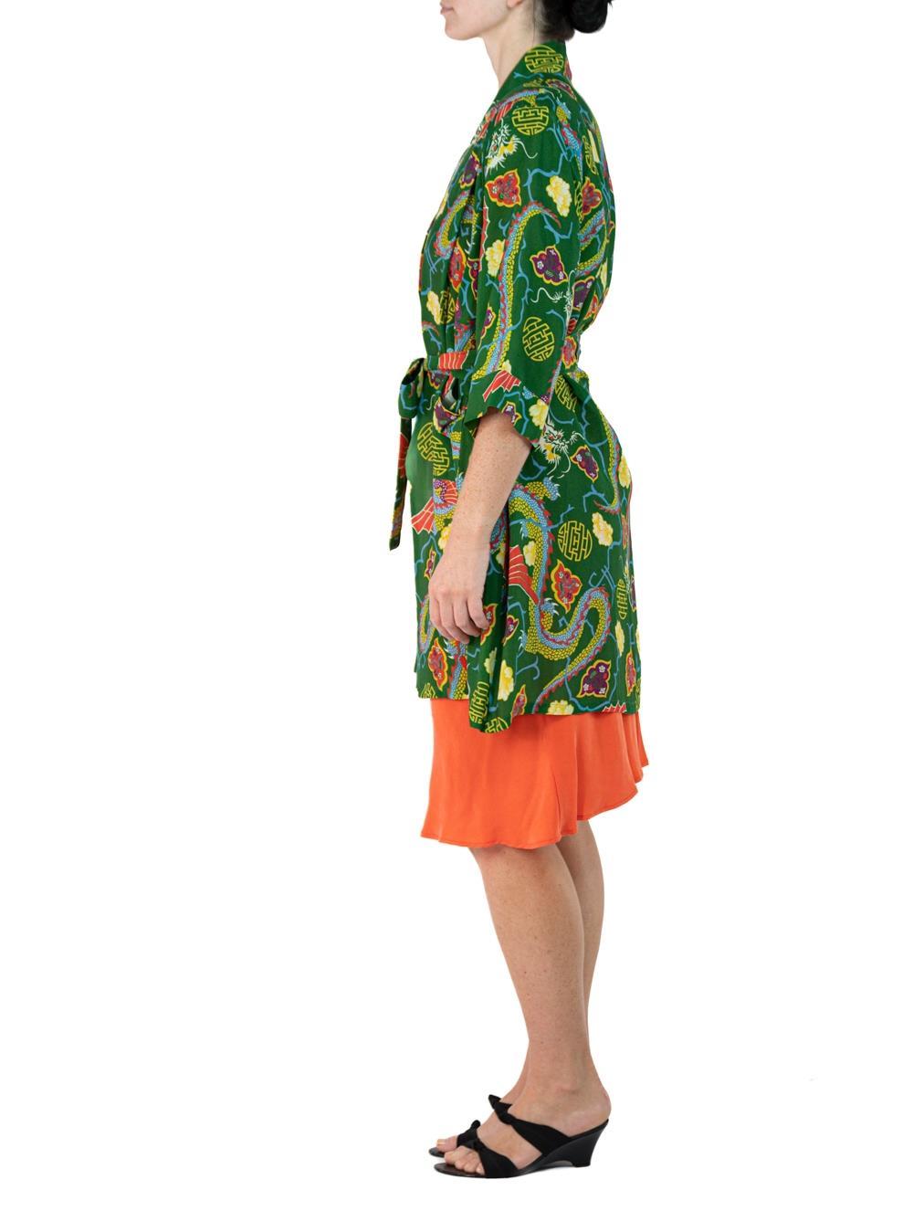 Morphew Collection Green & Orange Dragon Novelty Print Cold Rayon Bias Kimono Os 
MORPHEW COLLECTION is made entirely by hand in our NYC Ateliér of rare antique materials sourced from around the globe. Our sustainable vintage materials represent