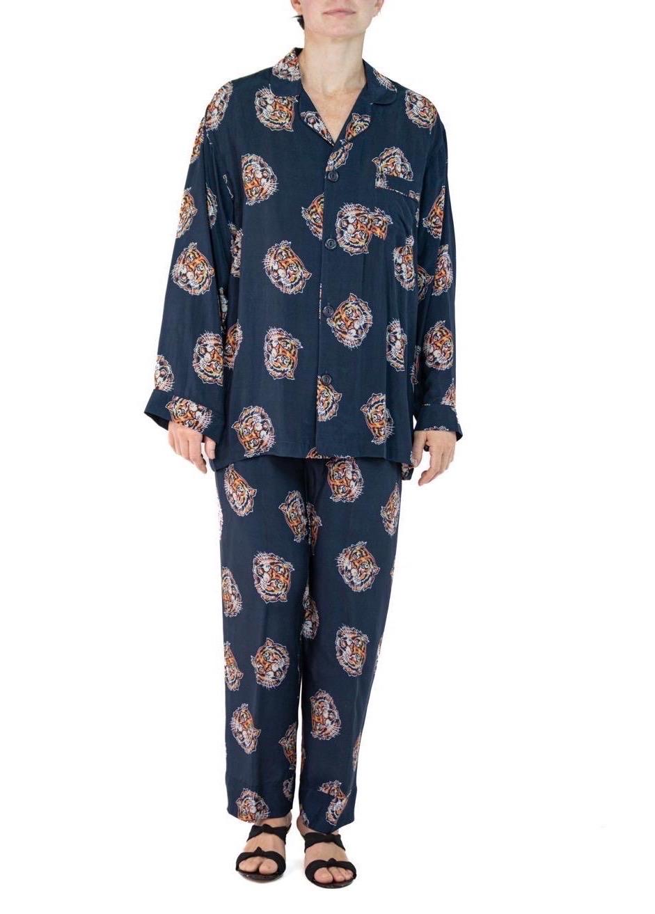 Morphew Collection Indigo Blue Tiger Head Print Cold Rayon Bias Pajamas
MORPHEW COLLECTION is made entirely by hand in our NYC Ateliér of rare antique materials sourced from around the globe. Our sustainable vintage materials represent over a