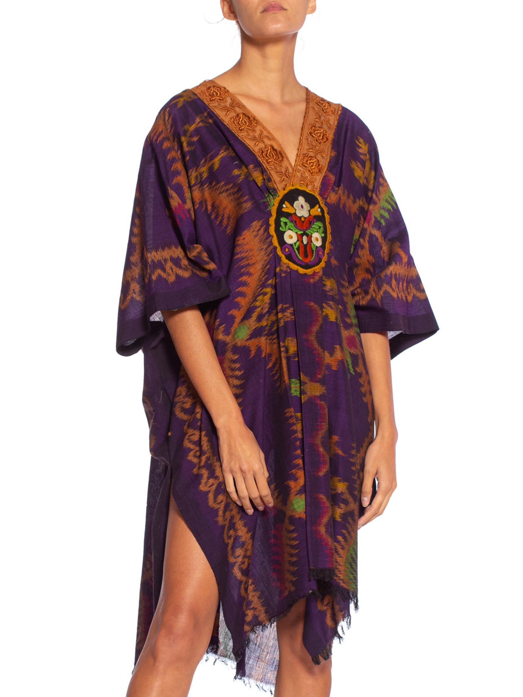 MORPHEW COLLECTION Purple & Brown Silk Ikat Kaftan Handmade With Victorian Lace Collar
MORPHEW COLLECTION is made entirely by hand in our NYC Ateliér of rare antique materials sourced from around the globe. Our sustainable vintage materials