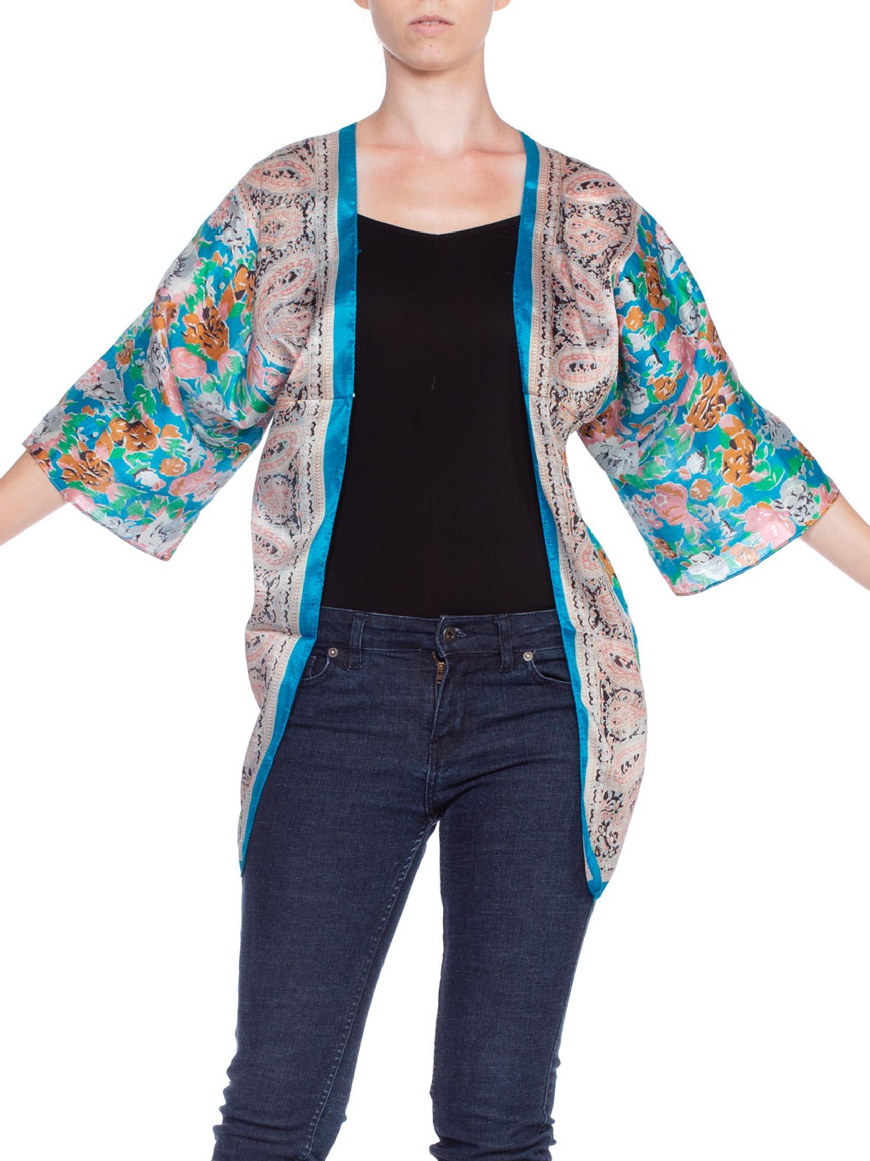 MORPHEW COLLECTION Blue & Green Hand Printed Silk Mini Kimono Jacket
MORPHEW COLLECTION is made entirely by hand in our NYC Ateliér of rare antique materials sourced from around the globe. Our sustainable vintage materials represent over a century